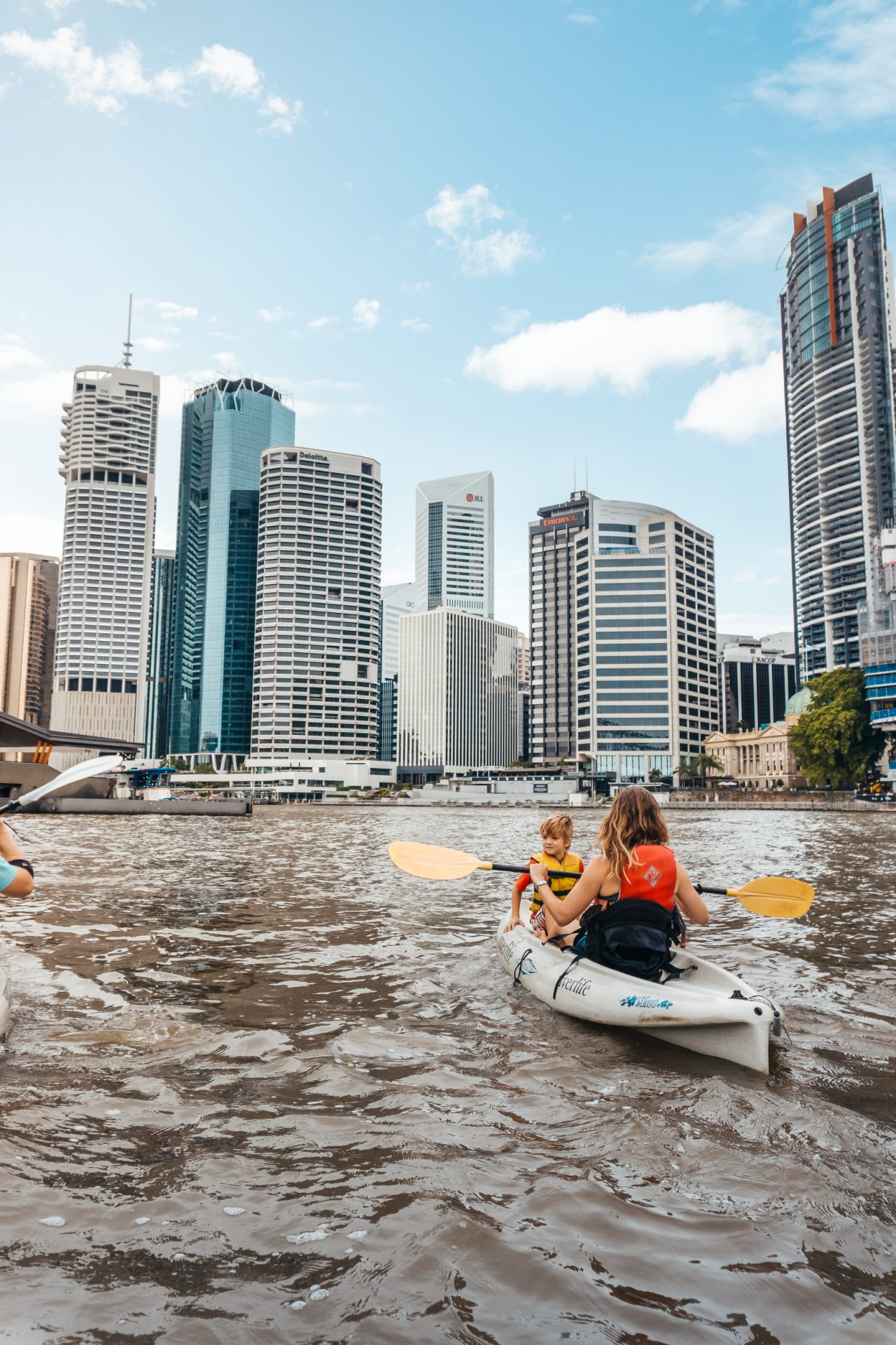 Family kayaking along the Brisbane River, RiverLife | Things to do in Brisbane with kids