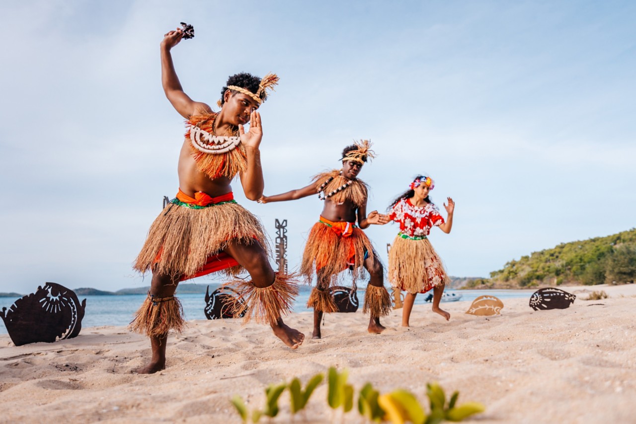 A group of Torres Strait Islander performers showcasing their cultural heritage