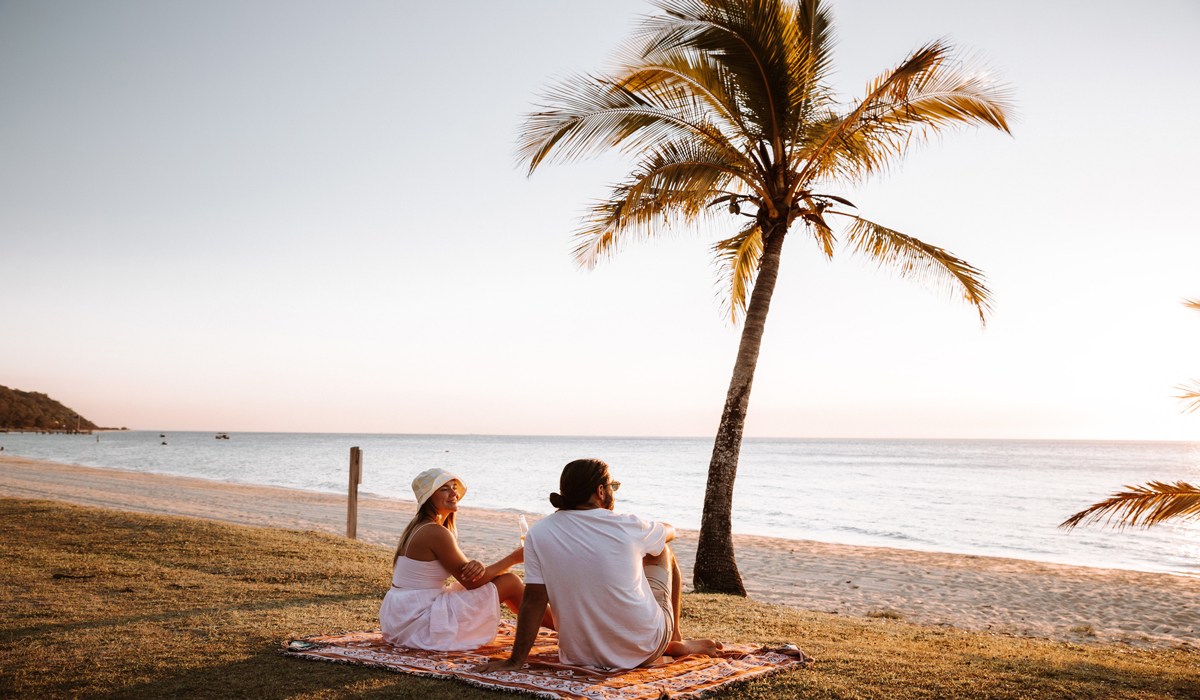 A couple enjoying the sunset at Tangalooma Island Resort, Moreton Island, Brisbane
