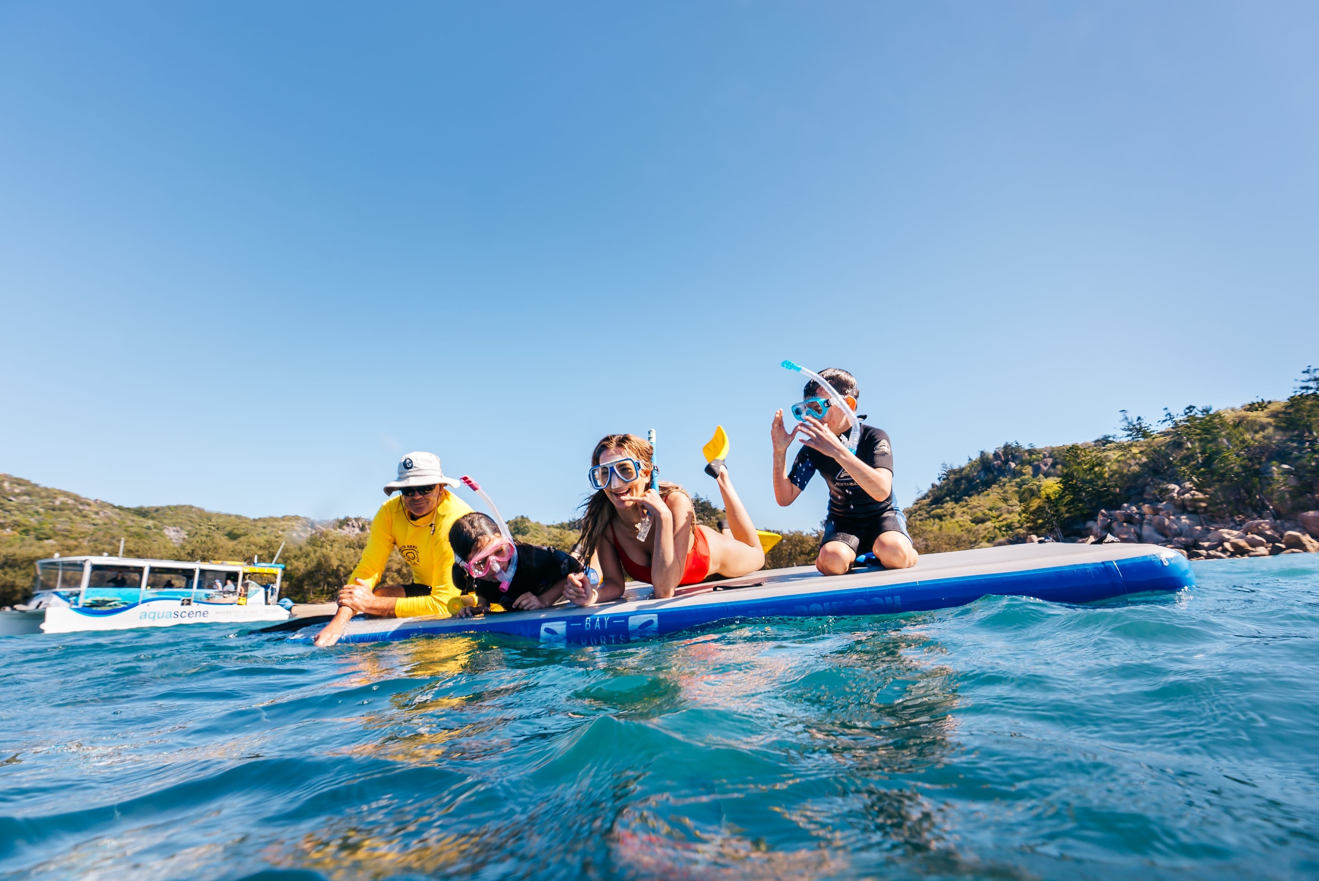 A family enjoying watersports near Magnetic Island