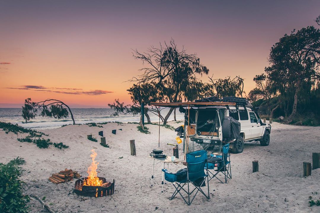 Camping set up on the beach at sunset Camping set up on the beach at sunset