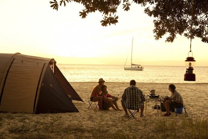 A group of friends camping on the beach at Swamp Bay A group of friends camping on the beach at Swamp Bay