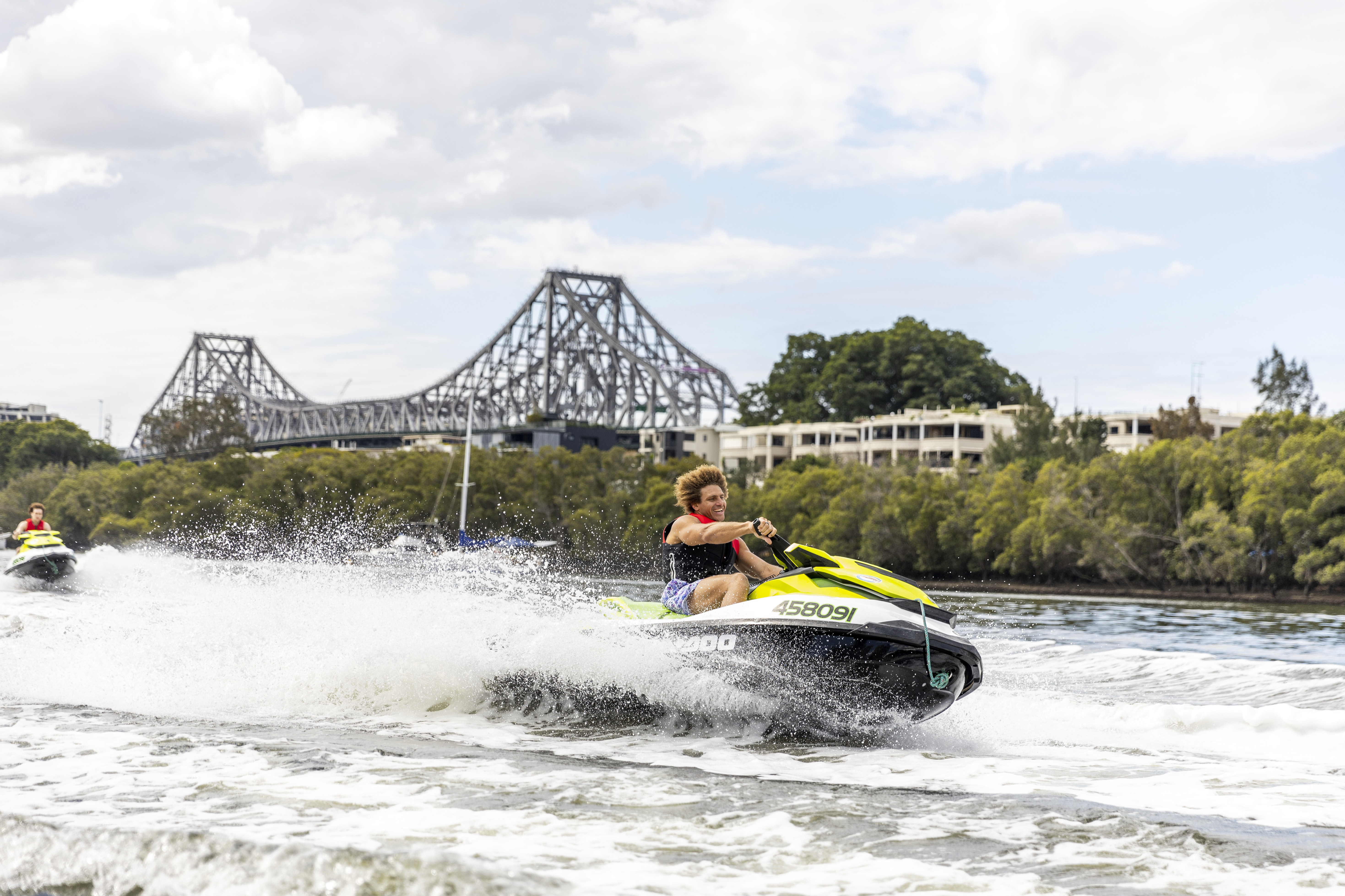 Man zooms through river on jet ski
