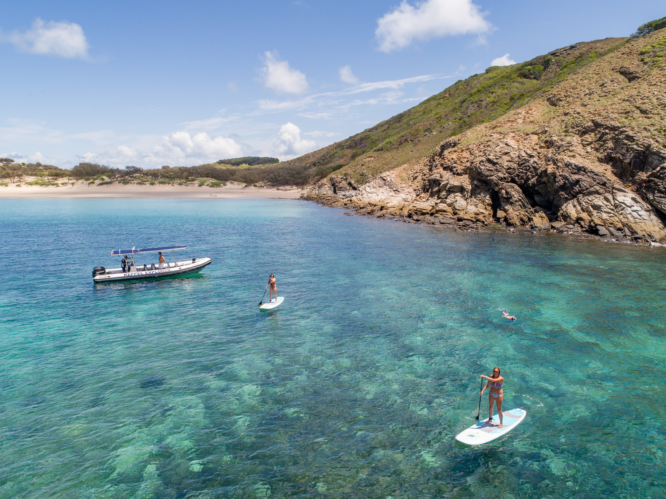 Standup paddle boarding Great Keppel Island | road trip sandstone wilderness Standup paddle boarding Great Keppel Island | road trip sandstone wilderness