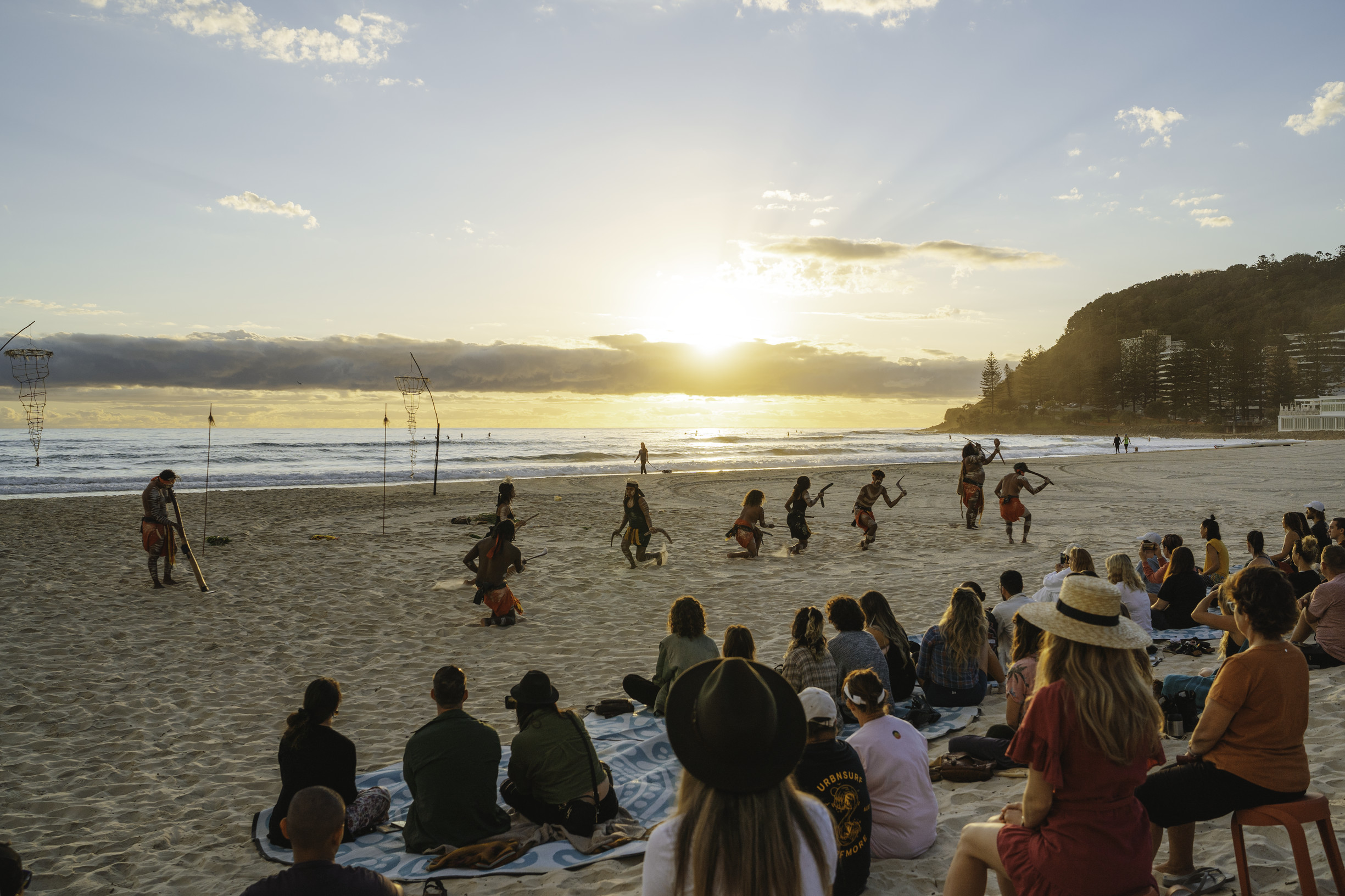 Indigenous performers on the beach at sunrise for BLEACH Festival, Gold Coast Indigenous performers on the beach at sunrise for BLEACH Festival, Gold Coast