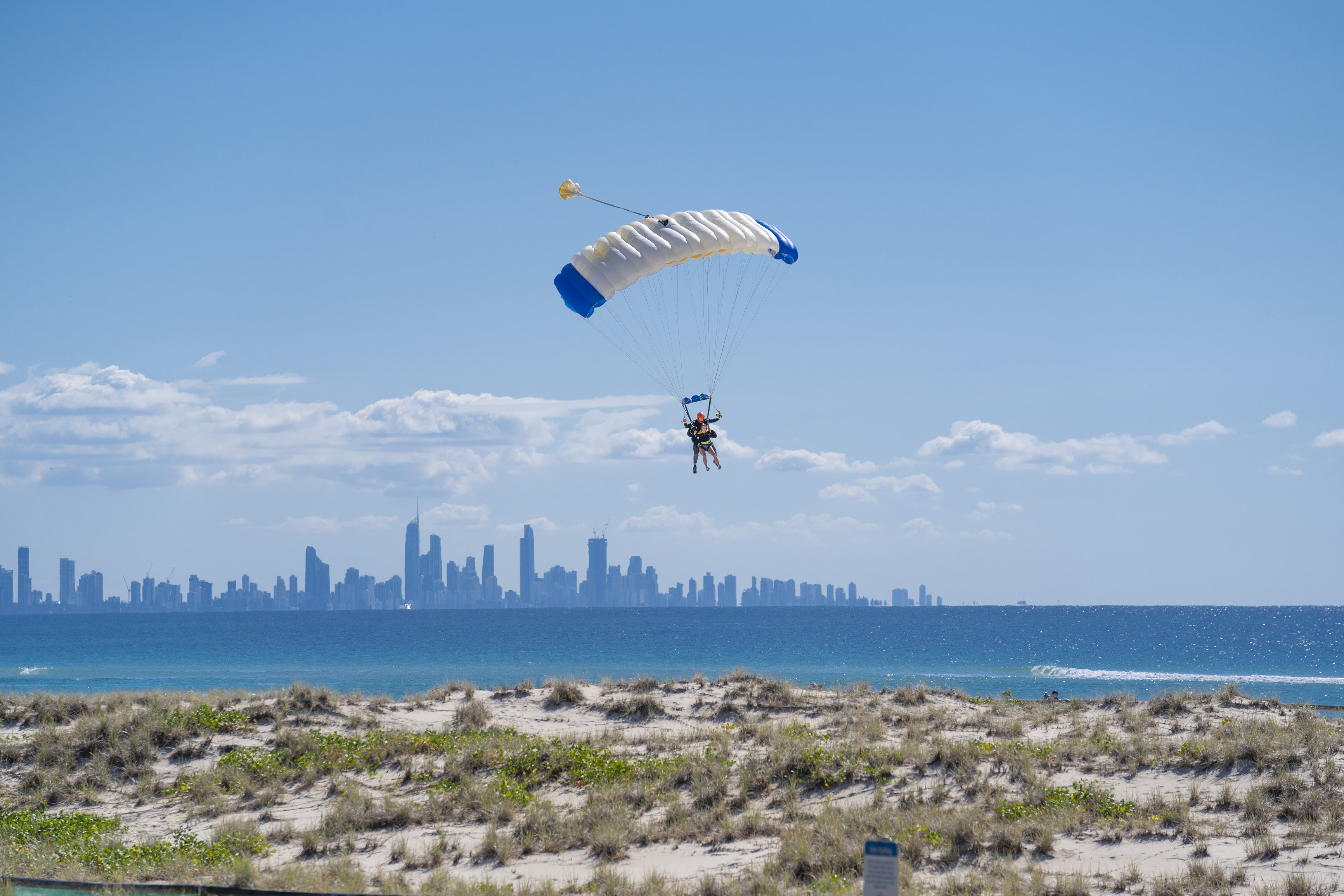 Parachutist landing over Kirra Beach with Gold Coast Skydive