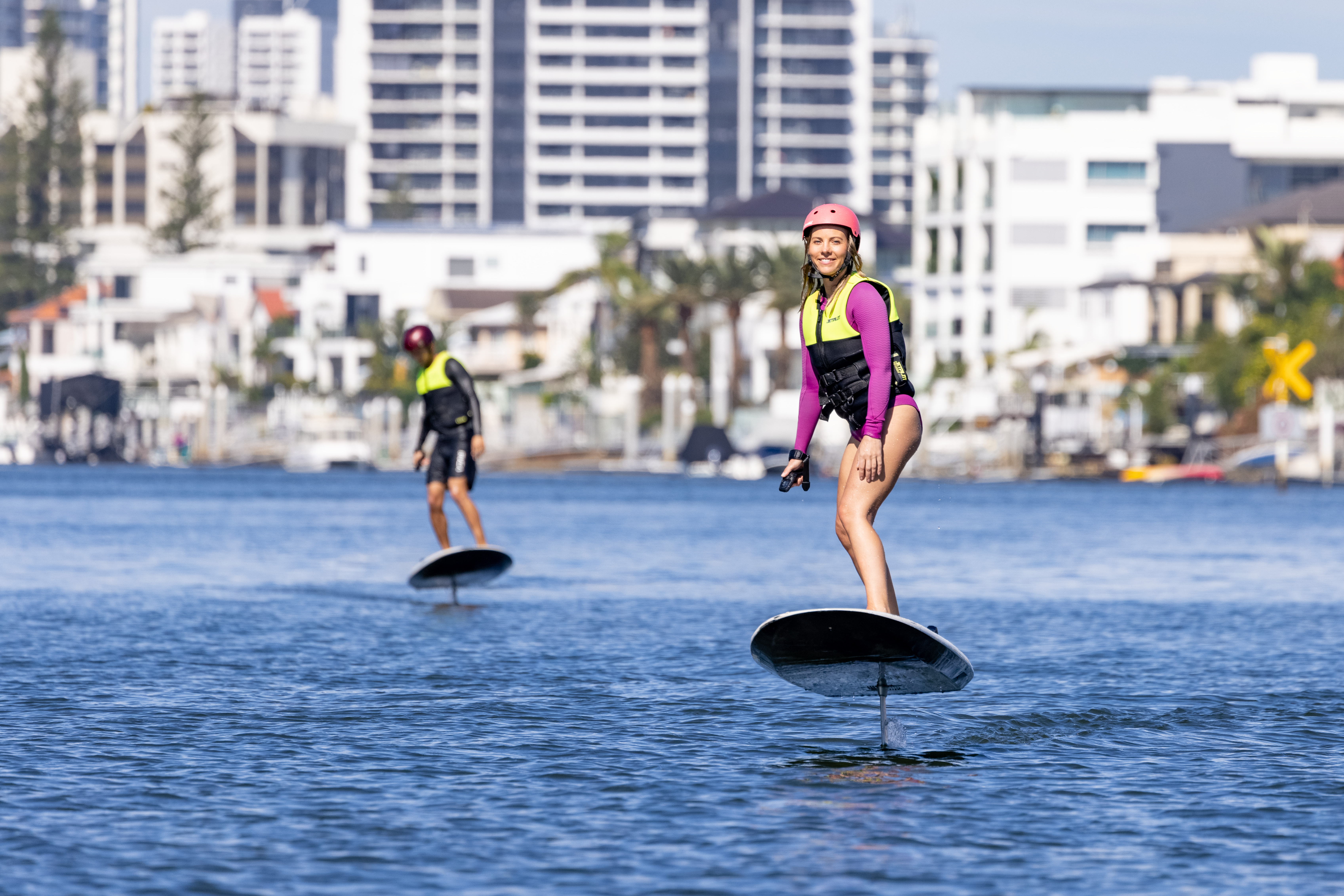 Lady experiencing a hydrofoil on the Gold Coast waterways