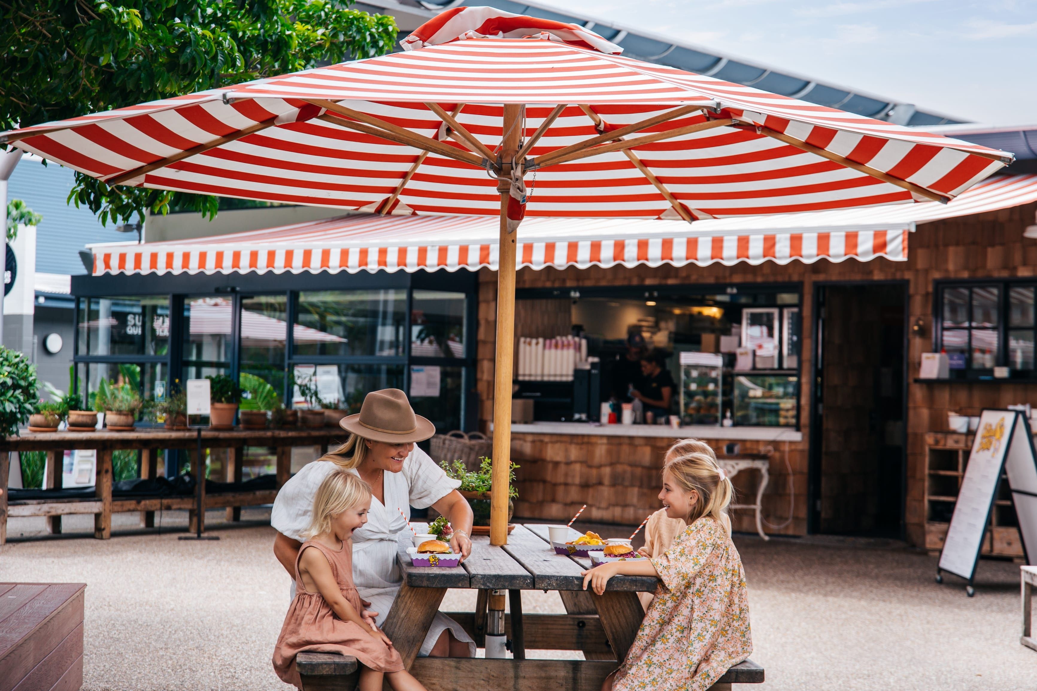 Family having coffee and brunch at Custard Canteen, Palm Beach Family having coffee and brunch at Custard Canteen, Palm Beach