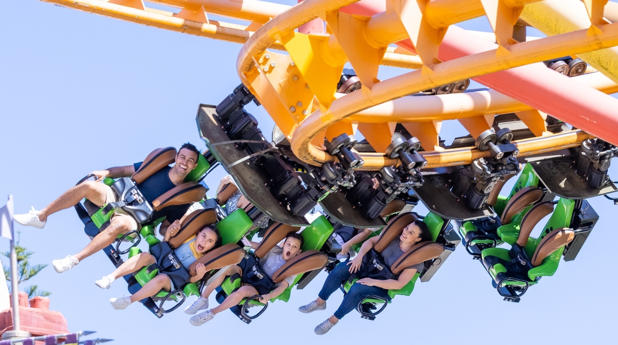 Family enjoying a rollercoaster ride at Dreamworld Family enjoying a rollercoaster ride at Dreamworld