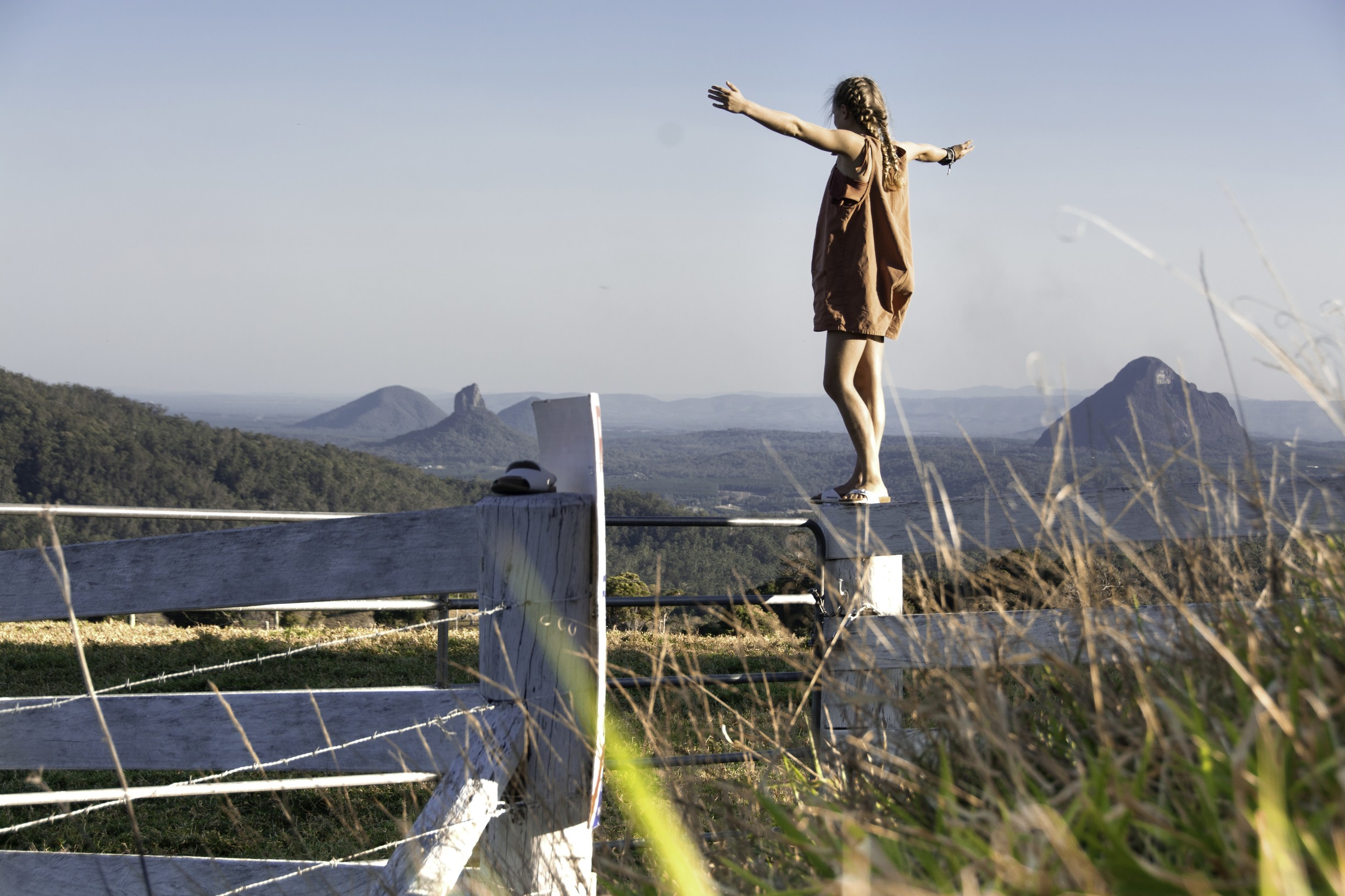 Young girl with views of Glass House Mountains | Budget Sunshine Coast holiday Young girl with views of Glass House Mountains | Budget Sunshine Coast holiday