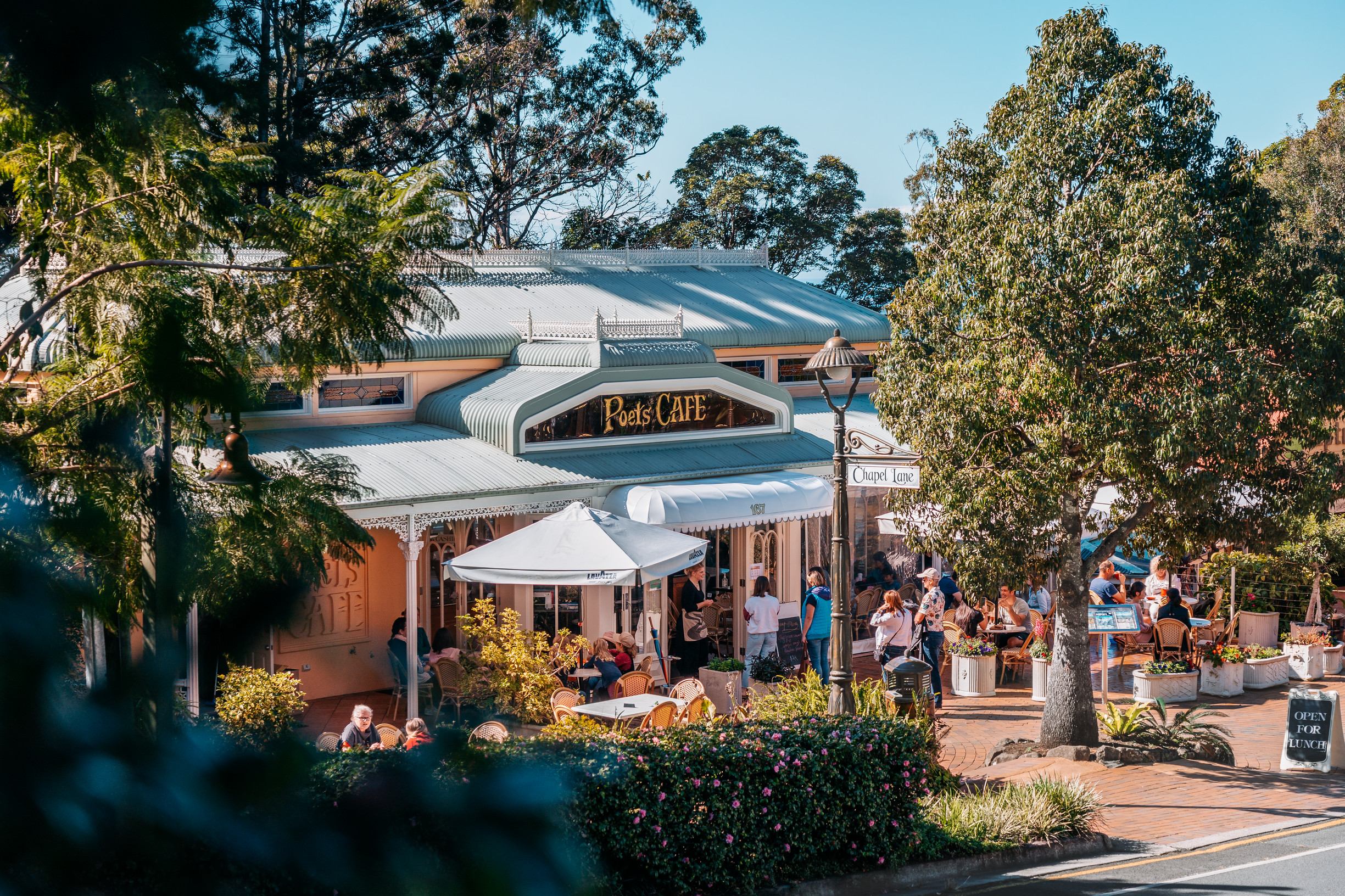 People walking into Poets Cafe, Main Street of Montville | things to do montville People walking into Poets Cafe, Main Street of Montville | things to do montville