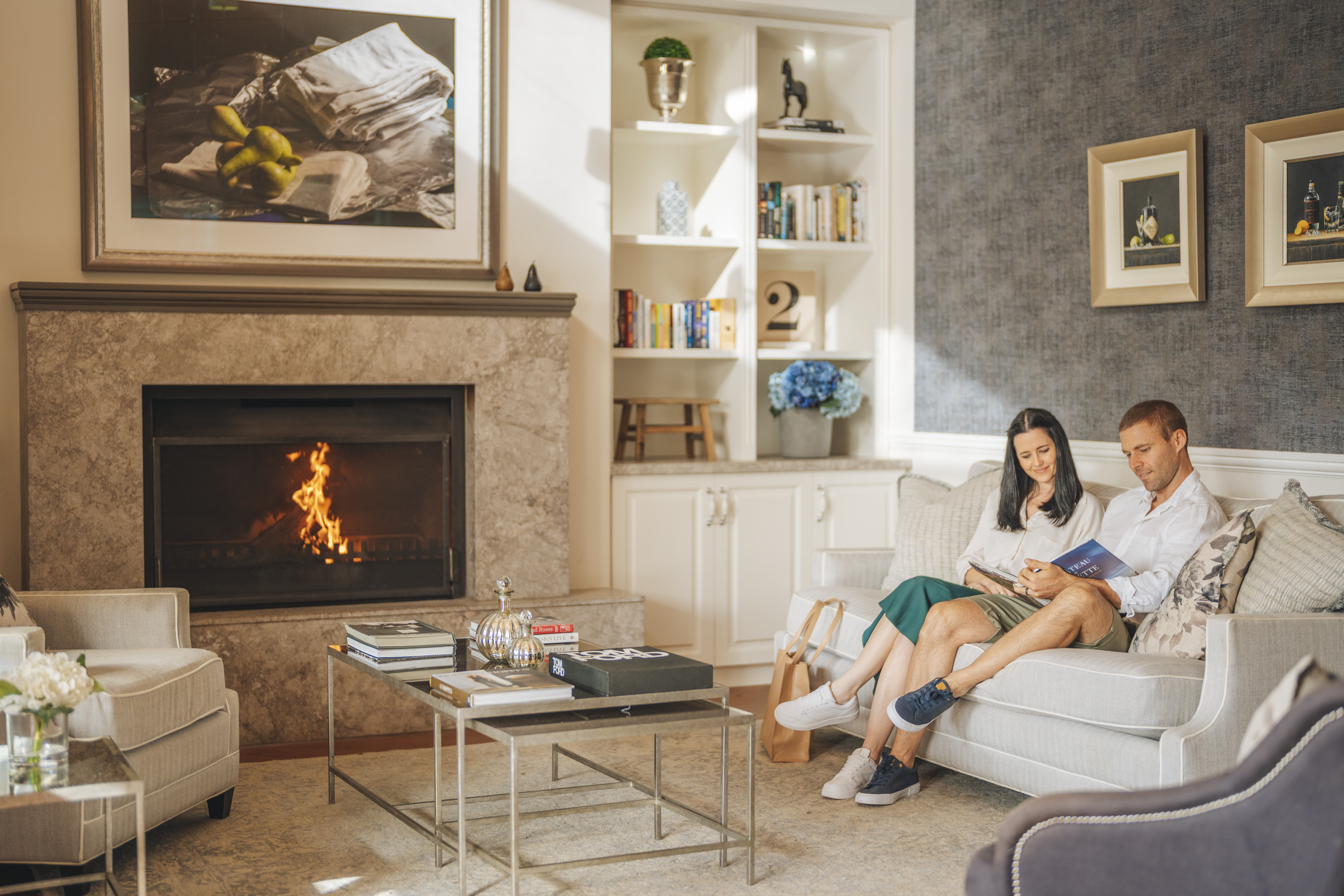 Couple relaxing in the main lounge area, at Spicers Clovelly Estate | sunshine coast hinterland accommodation Clovelly Estate Couple relaxing in the main lounge area, at Spicers Clovelly Estate | sunshine coast hinterland accommodation Clovelly Estate
