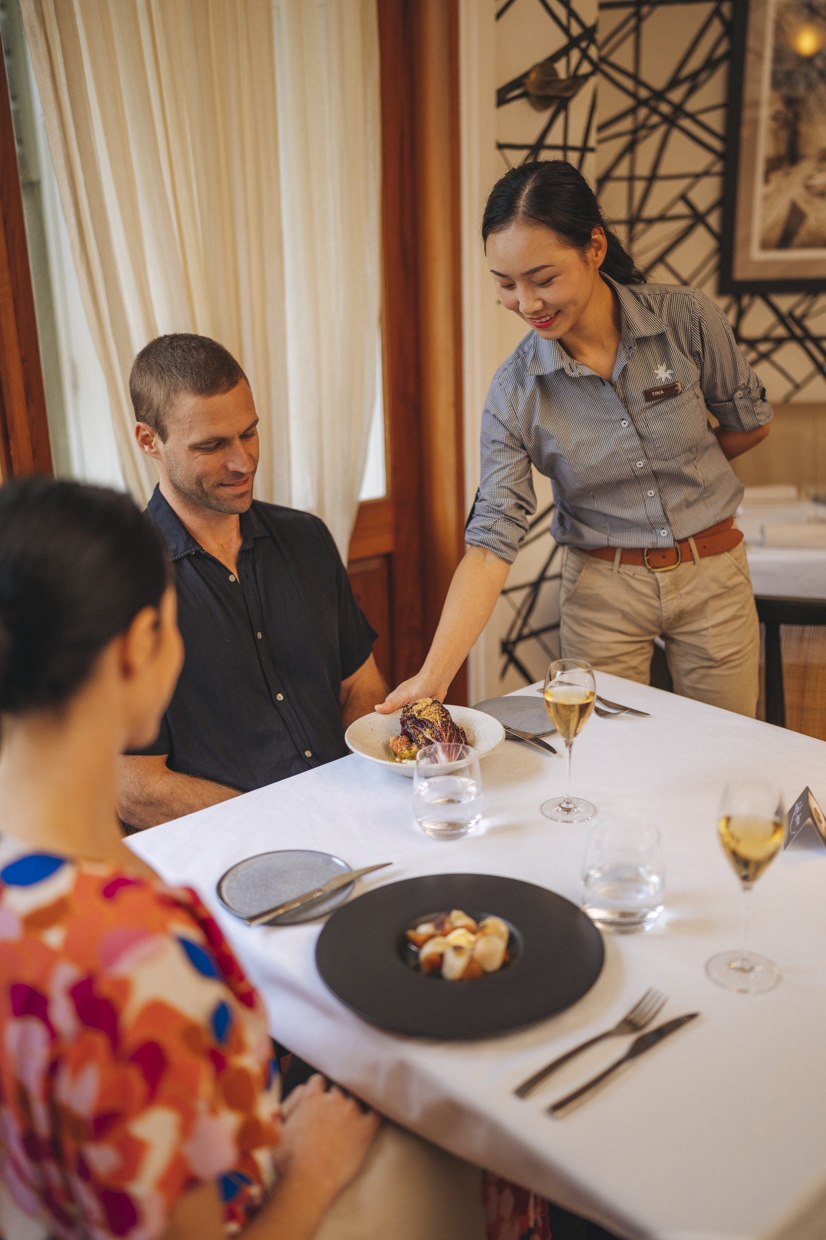 Couple dining at The Long Apron, located at Spicers Clovelly Estate 
