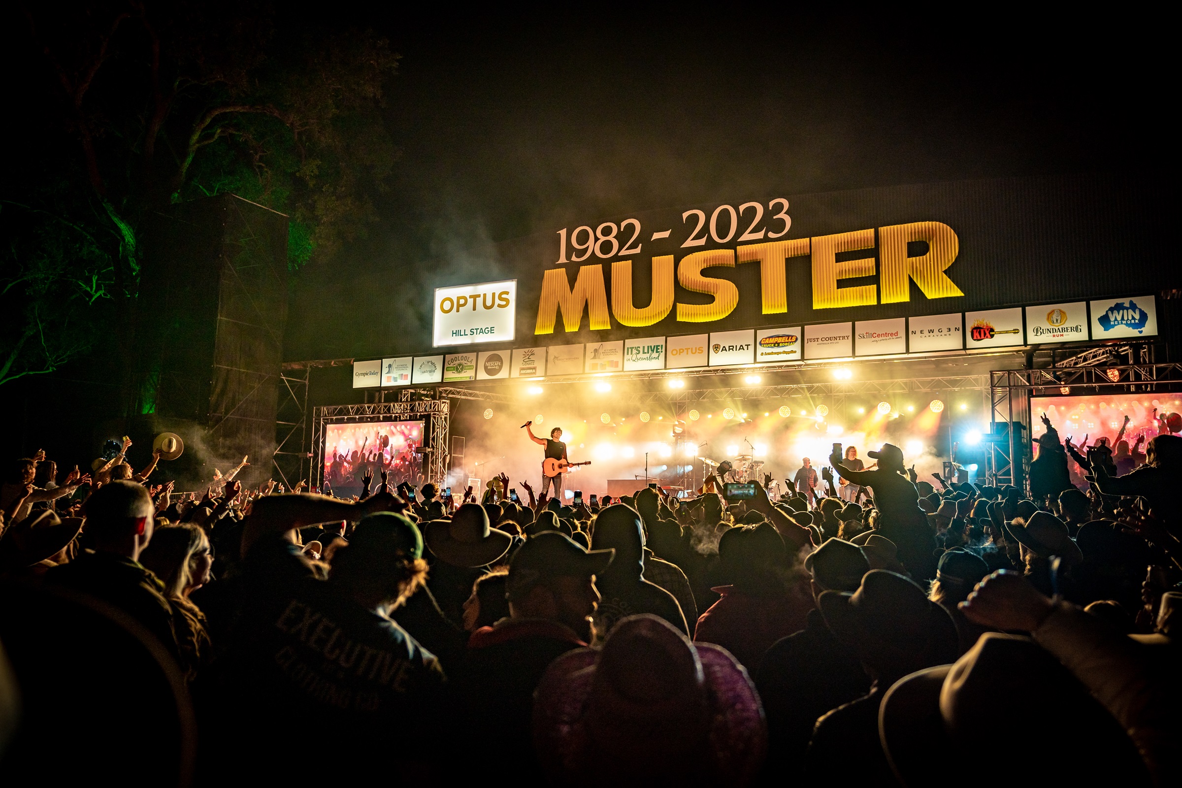 Country music artist Morgan Evans performs on the main stage at Gympie Music Muster, with crowd cheering on