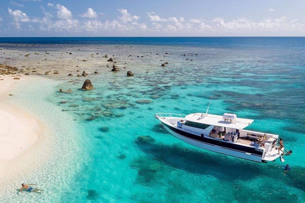 Aerial of a boat bordering Haggerstone Island