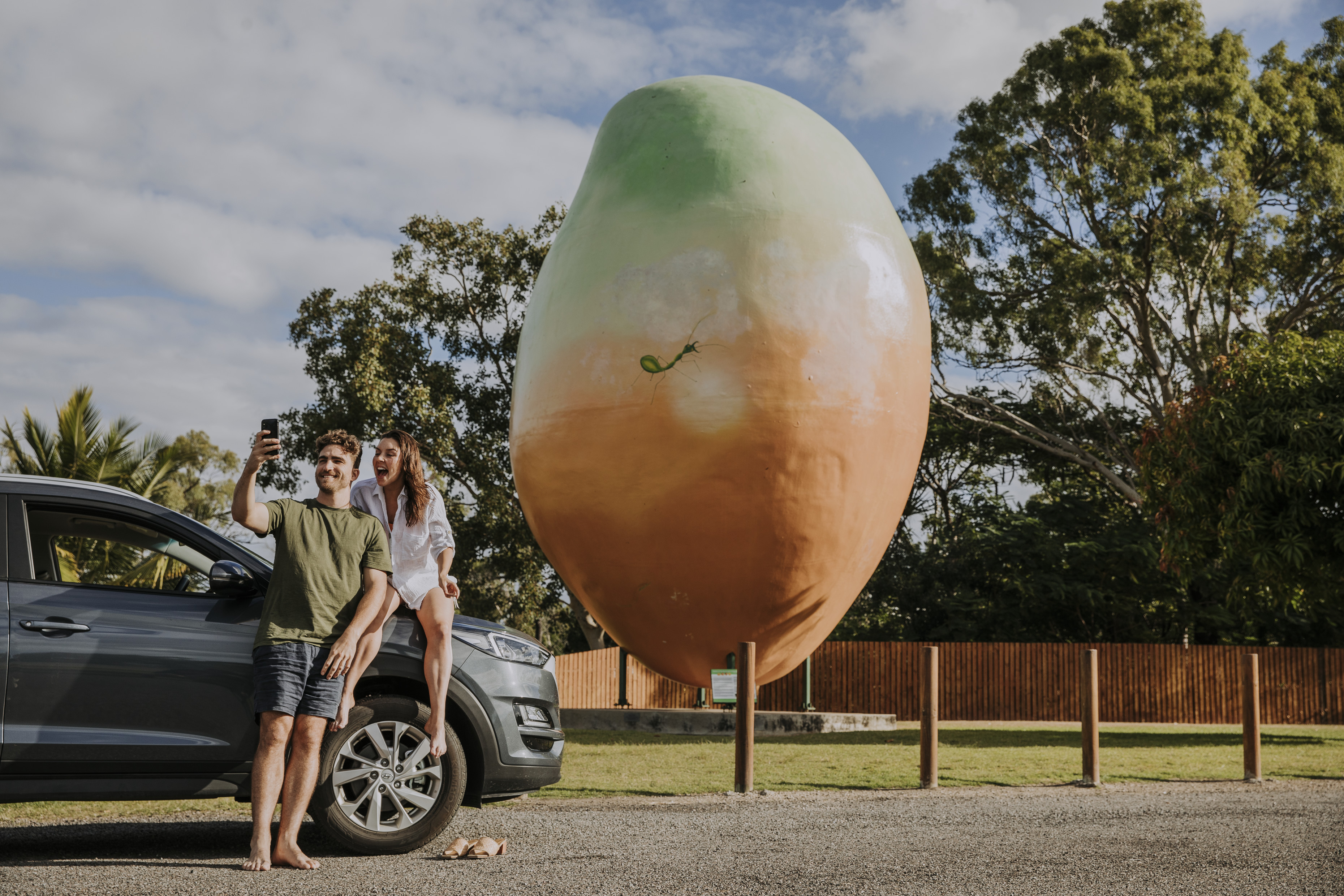 Couple taking selfie at The Big Mango Bowen