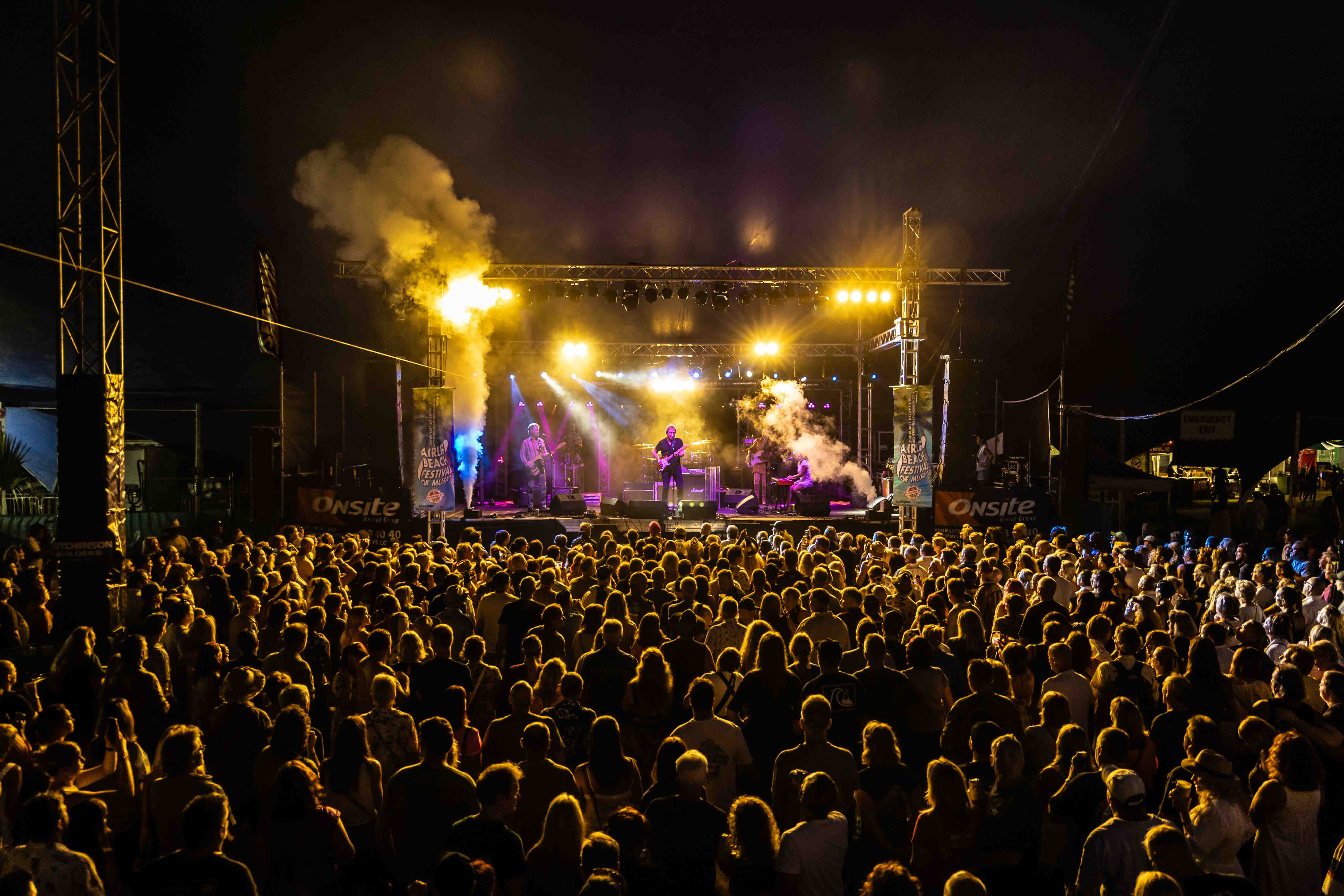 Large crowd watches band perform on the main stage at Airlie Beach Music Festival