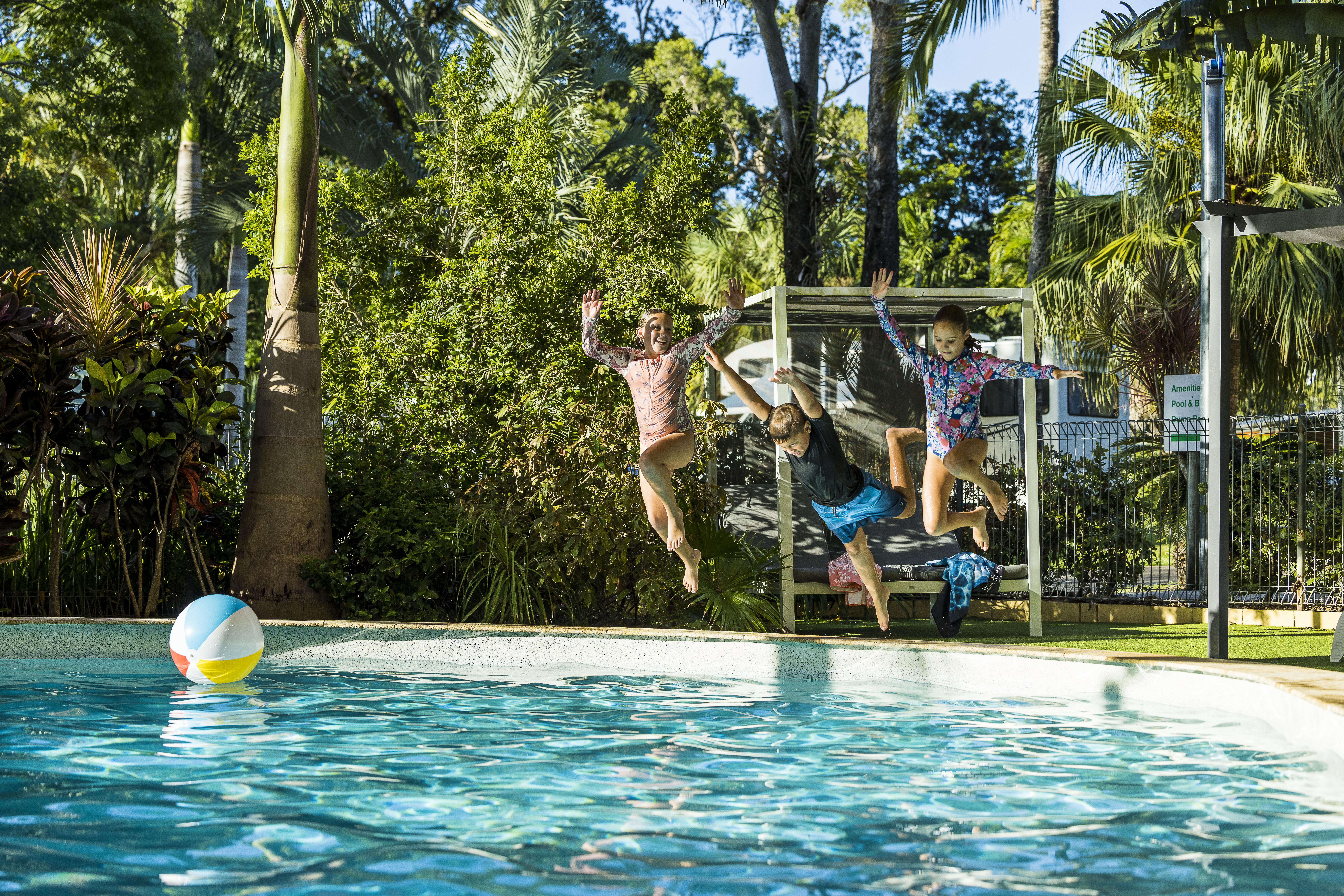 Children jumping into the pool at Big 4 Whitsunday Adventure Resort