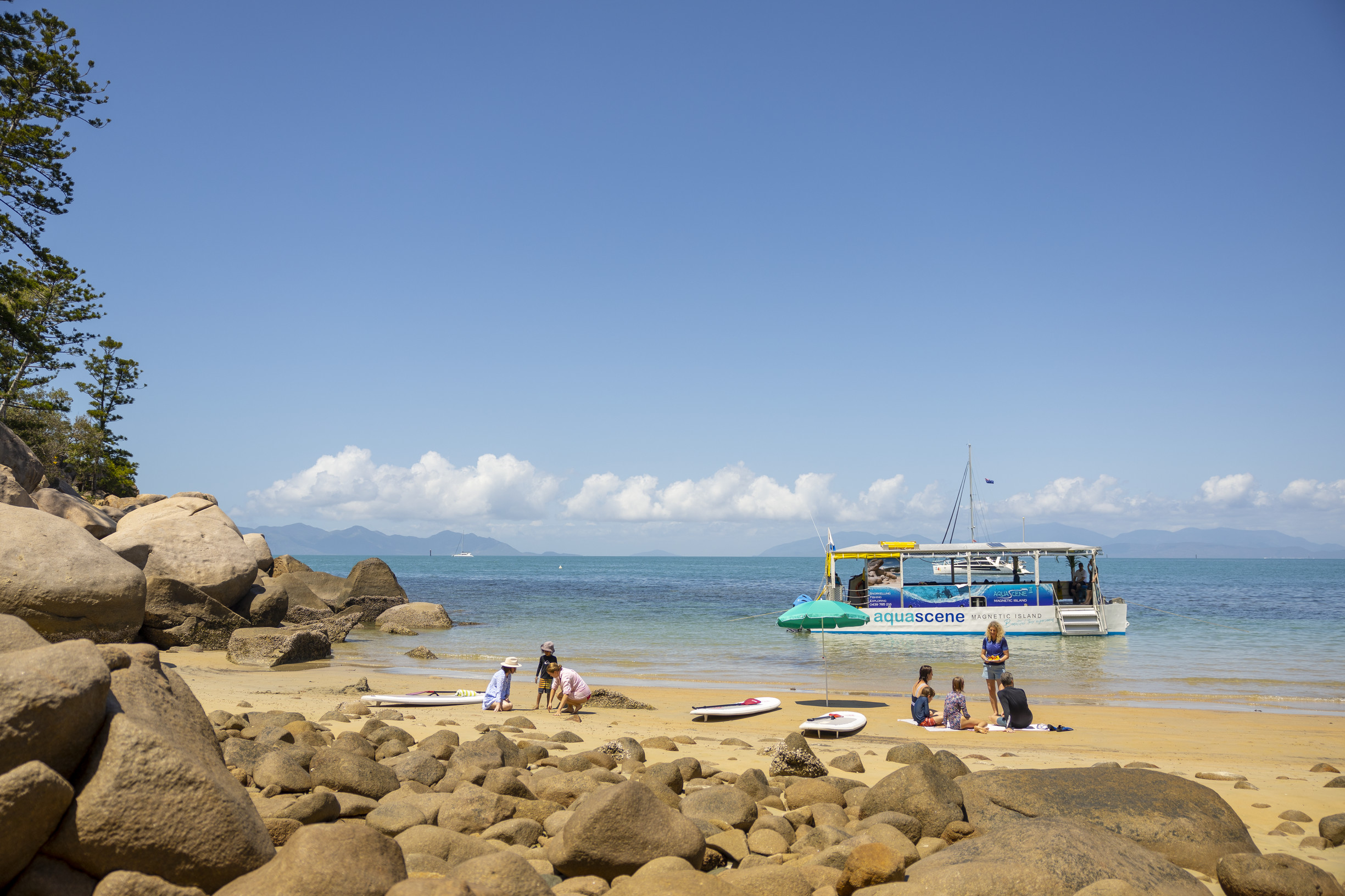 Snorkelling, SUP and swimming on the beach while on Maggie Discovery Tour with Aquascene Magnetic Island Snorkelling, SUP and swimming on the beach while on Maggie Discovery Tour with Aquascene Magnetic Island