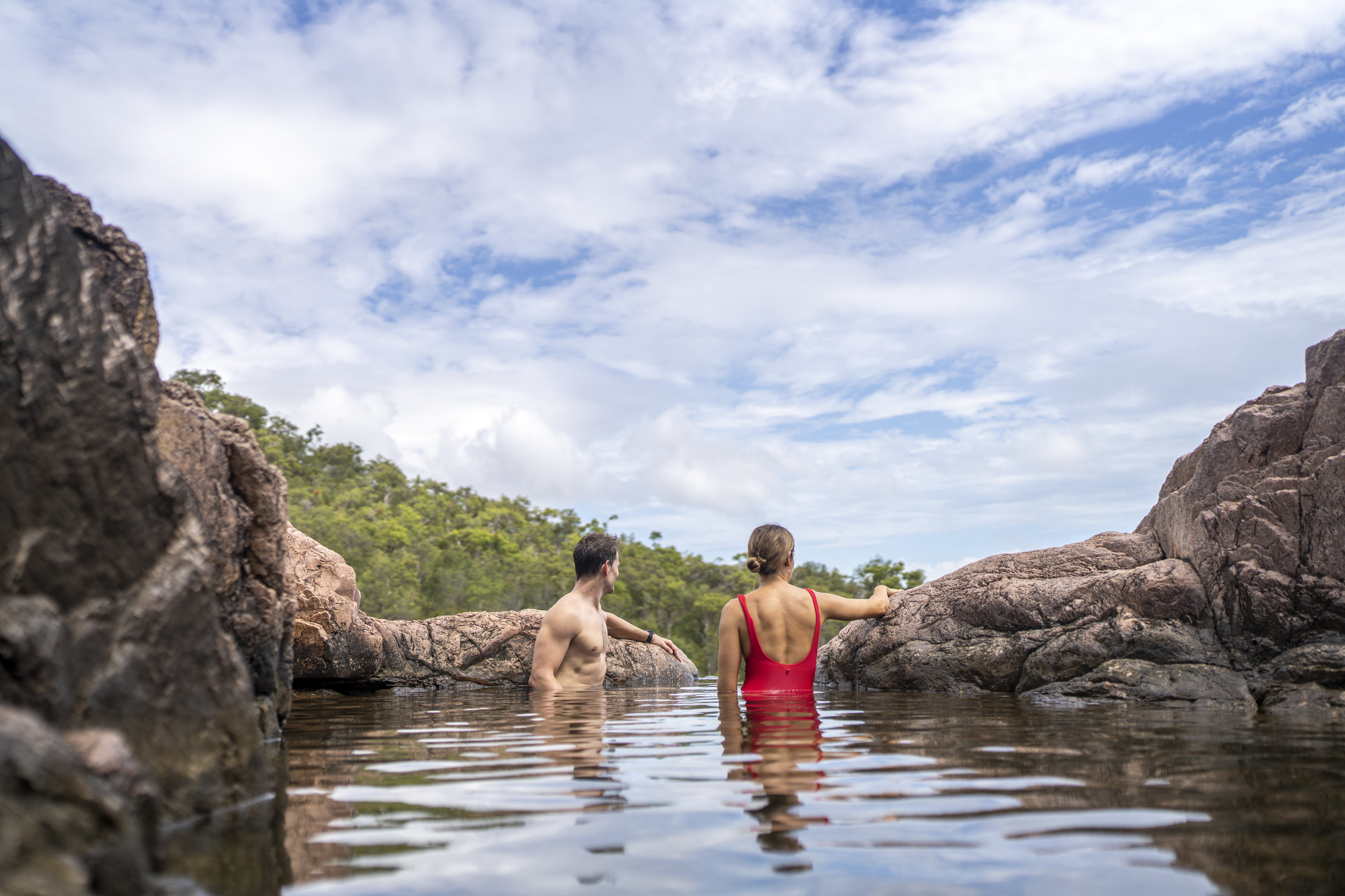 Couple swimming in the rock pools at Zoe Falls Couple swimming in the rock pools at Zoe Falls