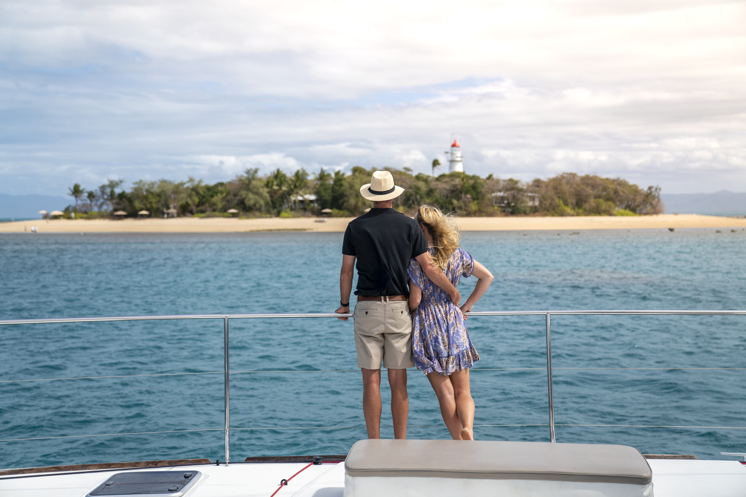 Couple on sailing boat at Low Isles, Sailaway | best day trips from Cairns Couple on sailing boat at Low Isles, Sailaway | best day trips from Cairns
