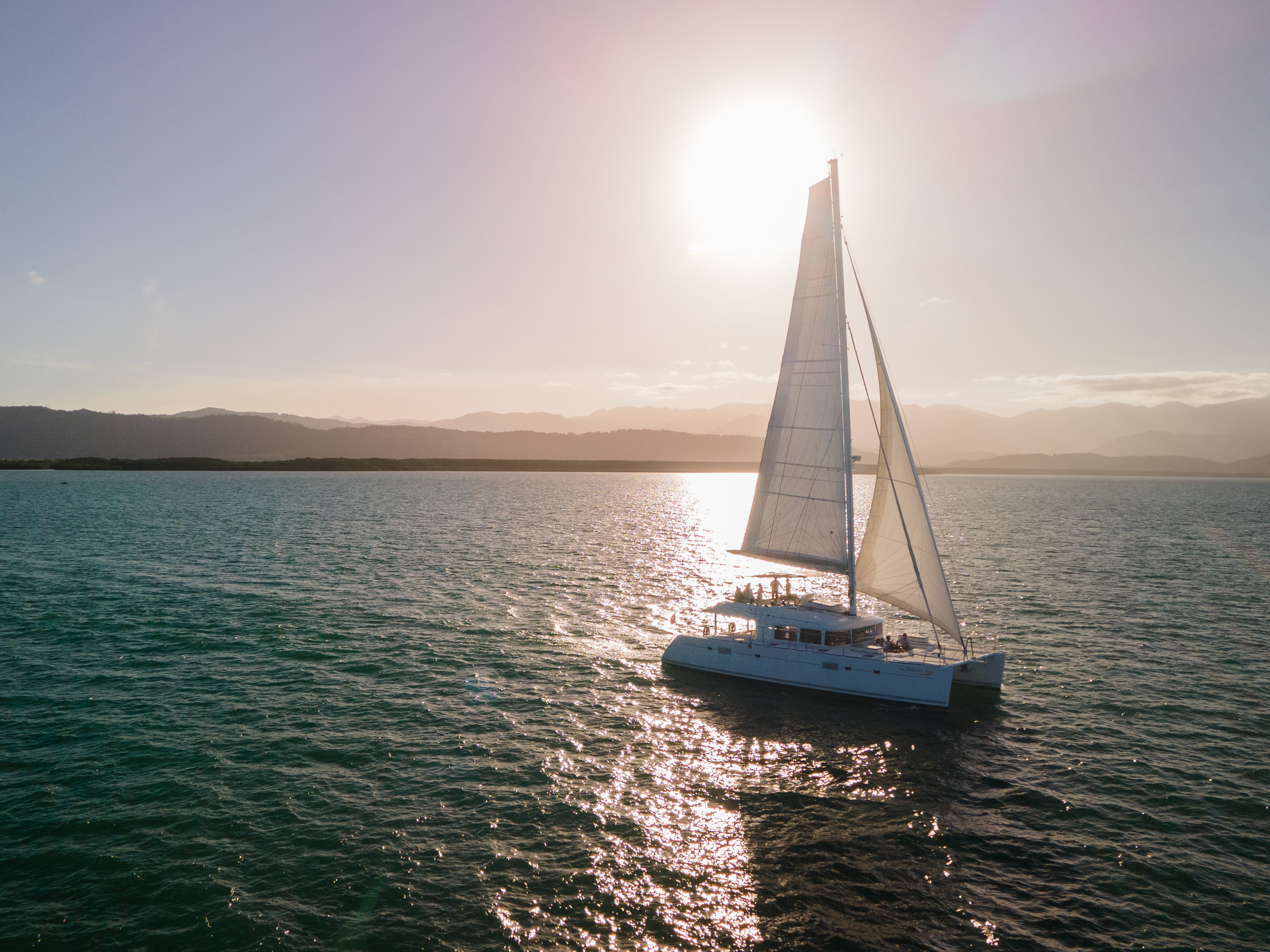 Sailaway cruise sailing out of Port Douglas at sunset | what to do in port douglas at night Sailaway cruise sailing out of Port Douglas at sunset | what to do in port douglas at night