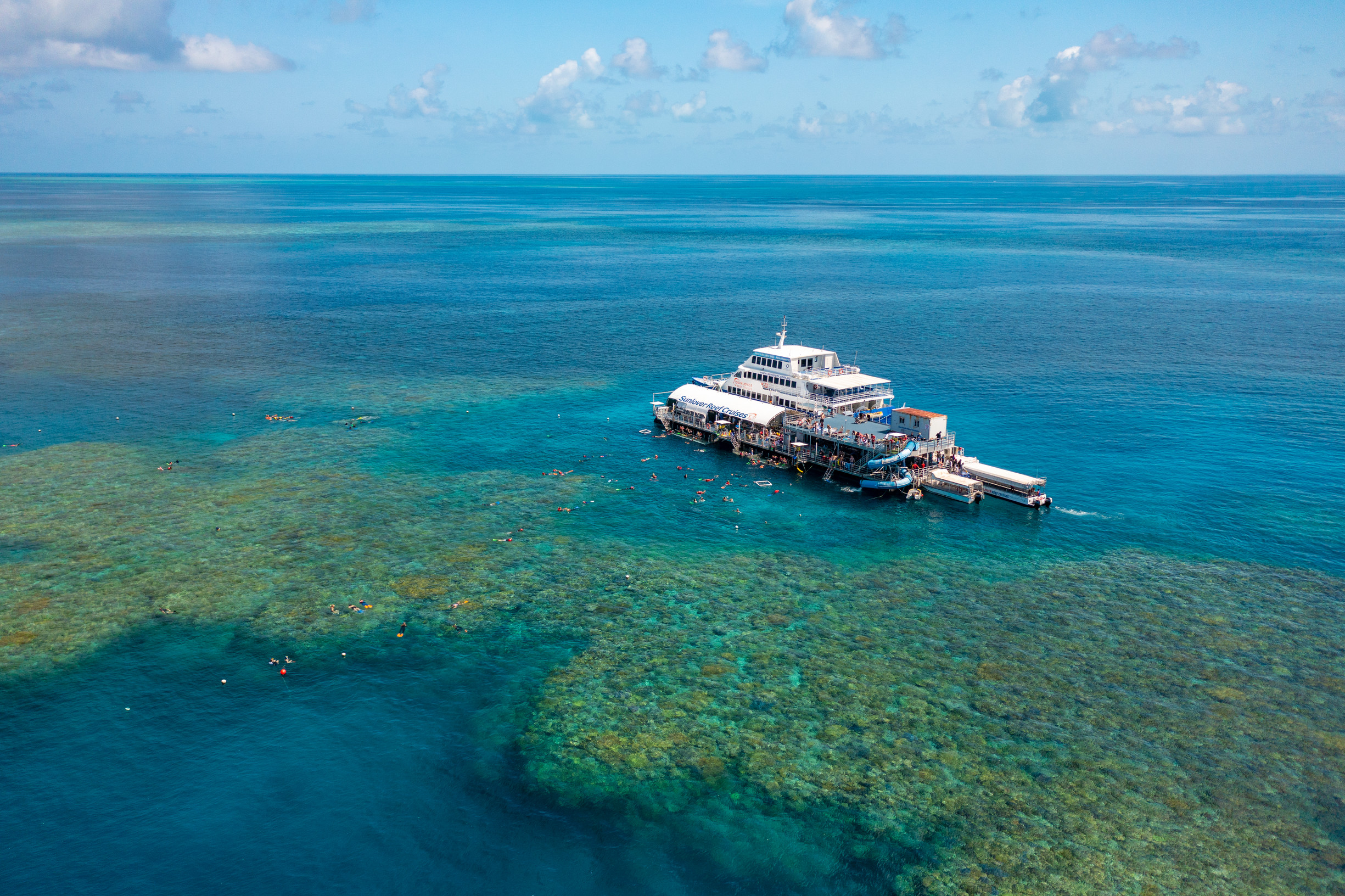 Aerial view of Sunlover Reef Cruise moored at Moore Reef pontoon | Queensland cruise holidays Aerial view of Sunlover Reef Cruise moored at Moore Reef pontoon | Queensland cruise holidays