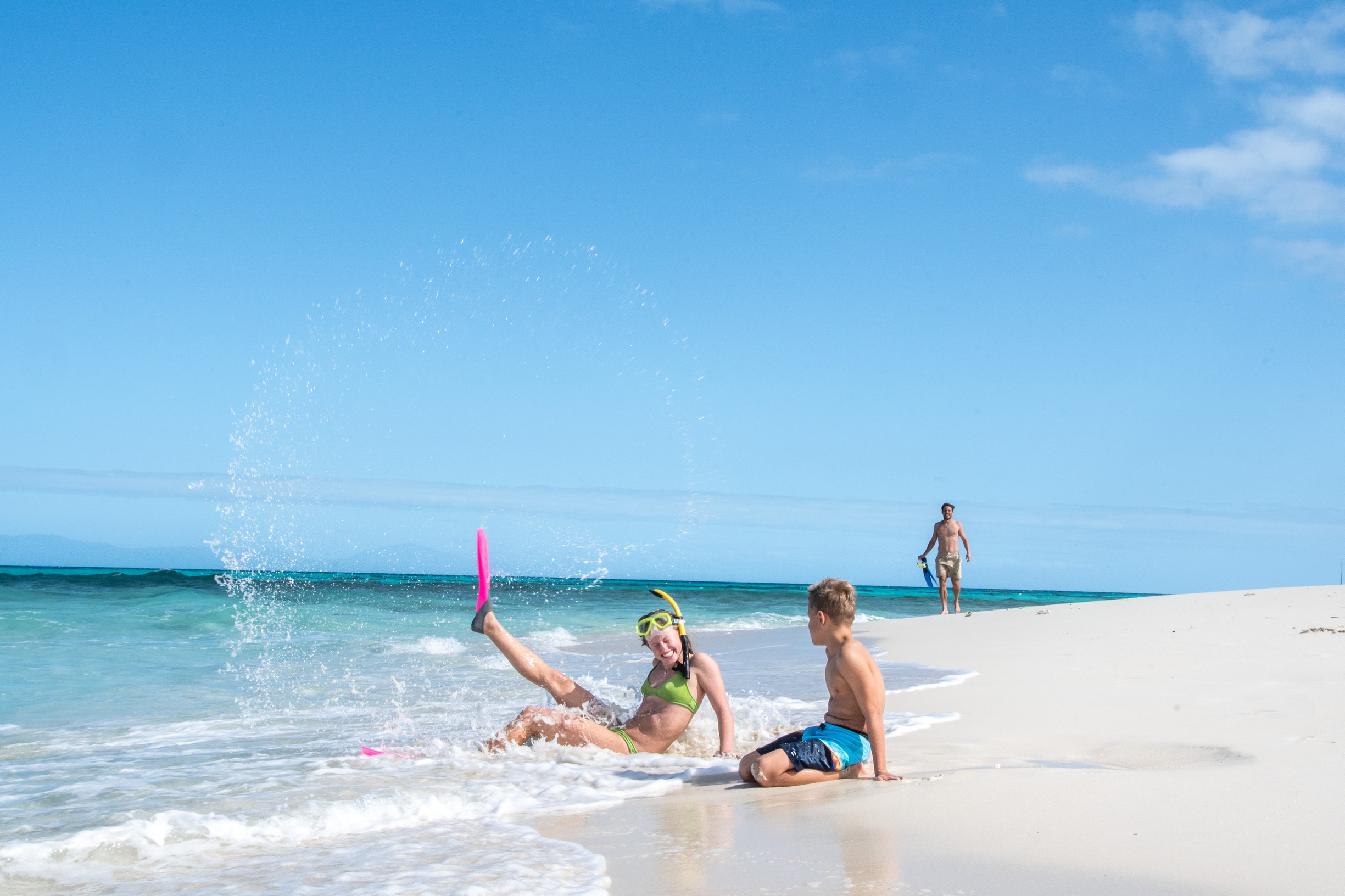 Family enjoying the beach on Vlasoff Cay after a helicopter ride with Nautilus Aviation Family enjoying the beach on Vlasoff Cay after a helicopter ride with Nautilus Aviation