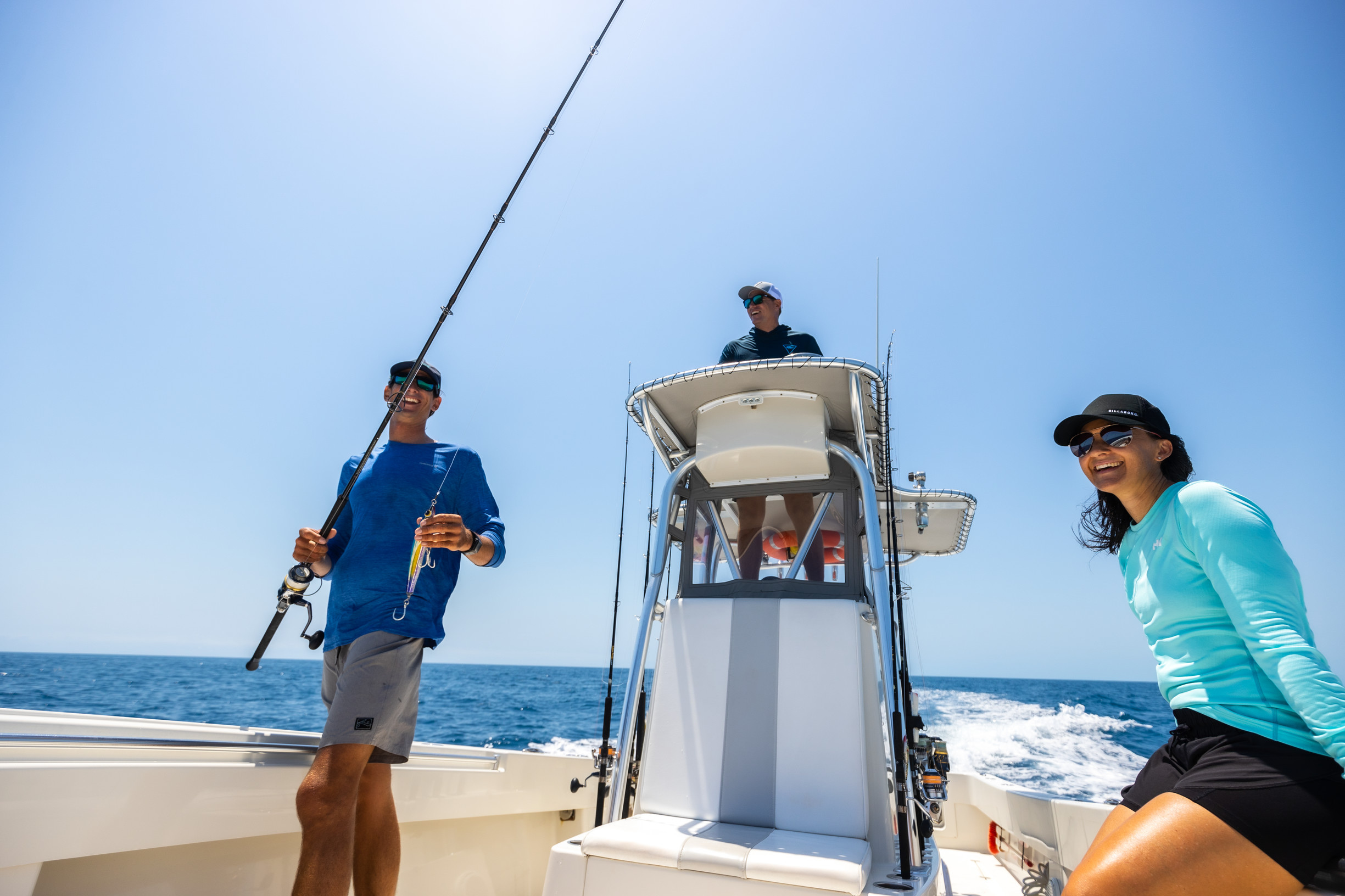 Guests enjoying themselves on a fishing charter