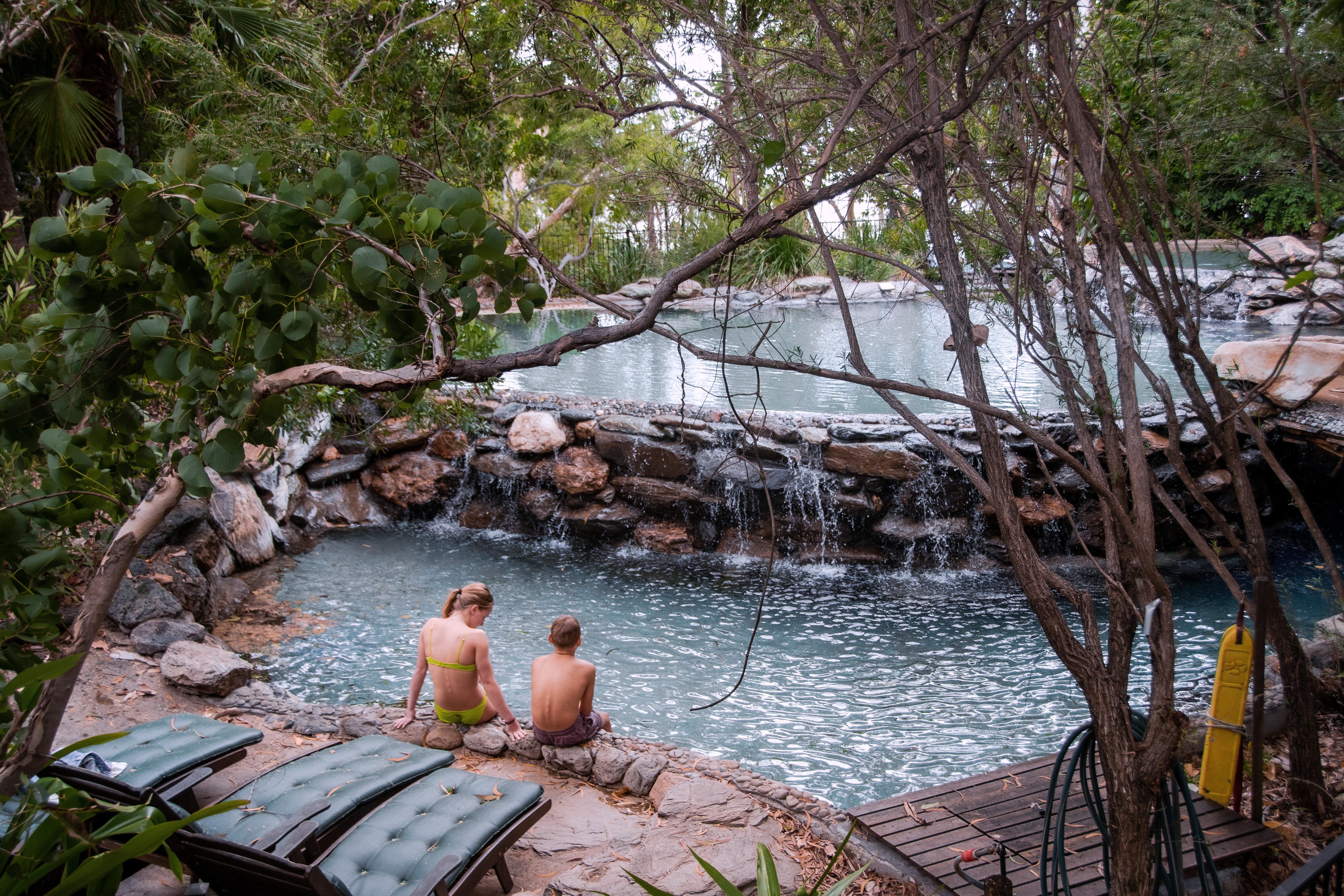 Young boy and girl enjoying the pool at Thala Beach Nature Reserve