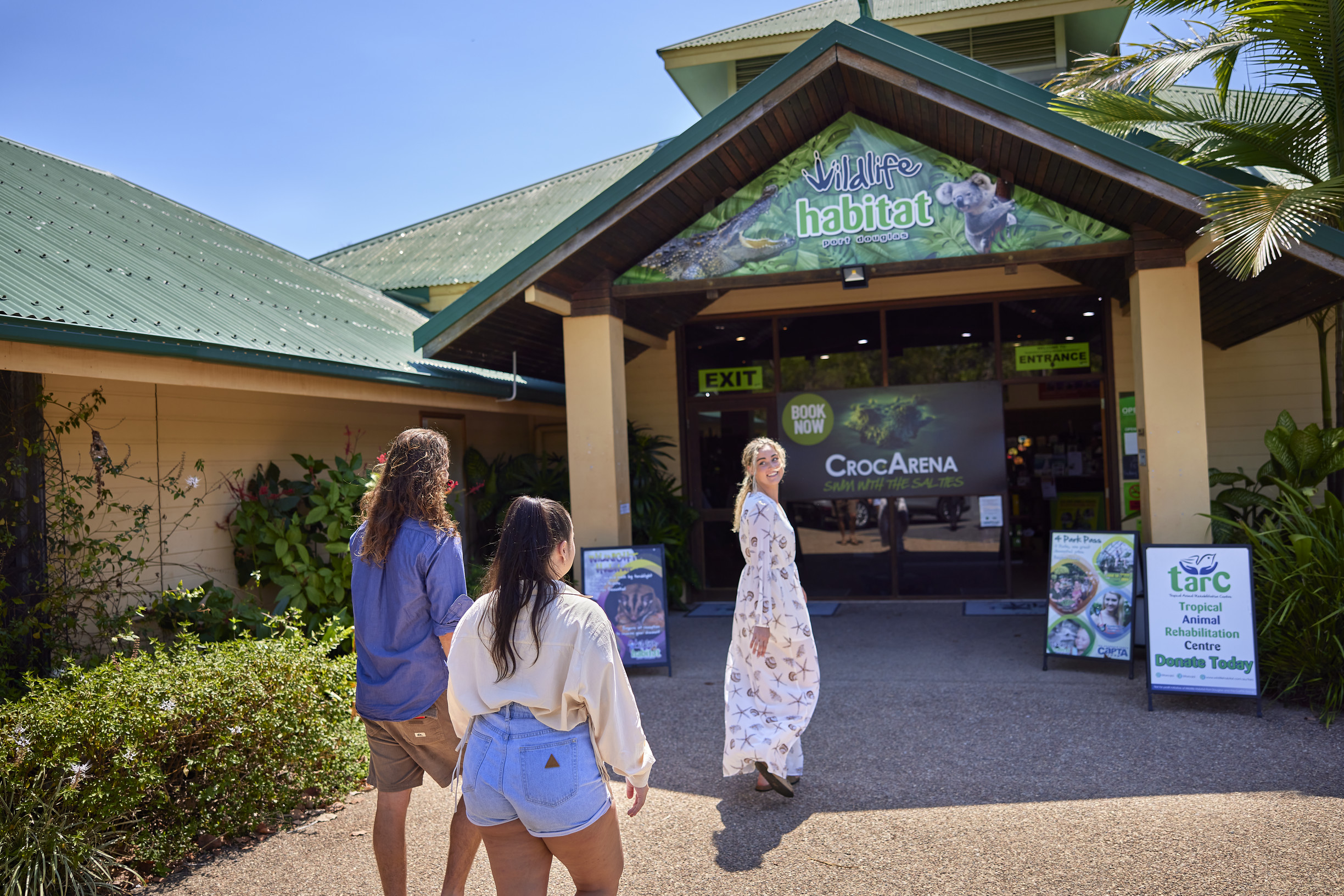 Group of friends walking towards the entrance of Wildlife Habitat