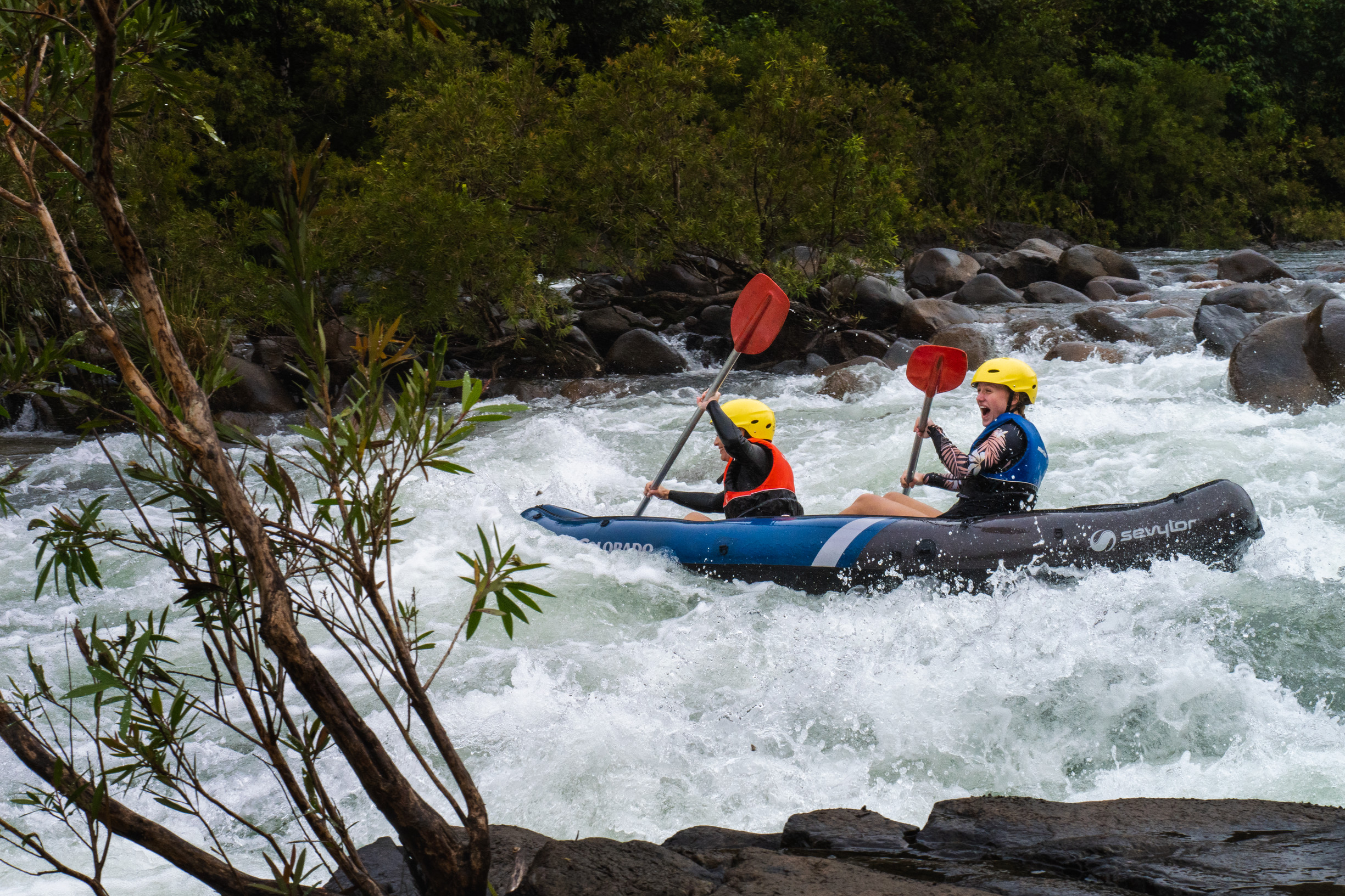 Family white water sports rafting down the Tully River with Wildside Adventures Family white water sports rafting down the Tully River with Wildside Adventures