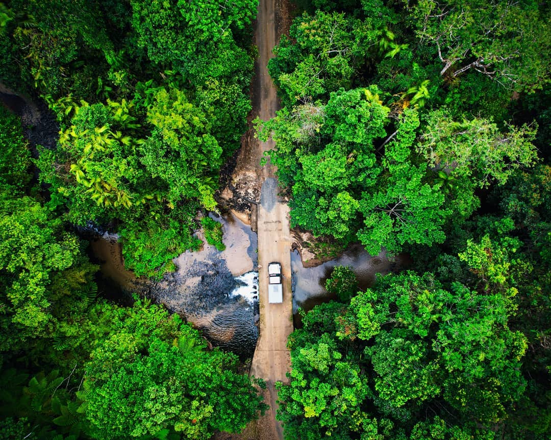 Car driving through the Misty Mountain Wilderness Track