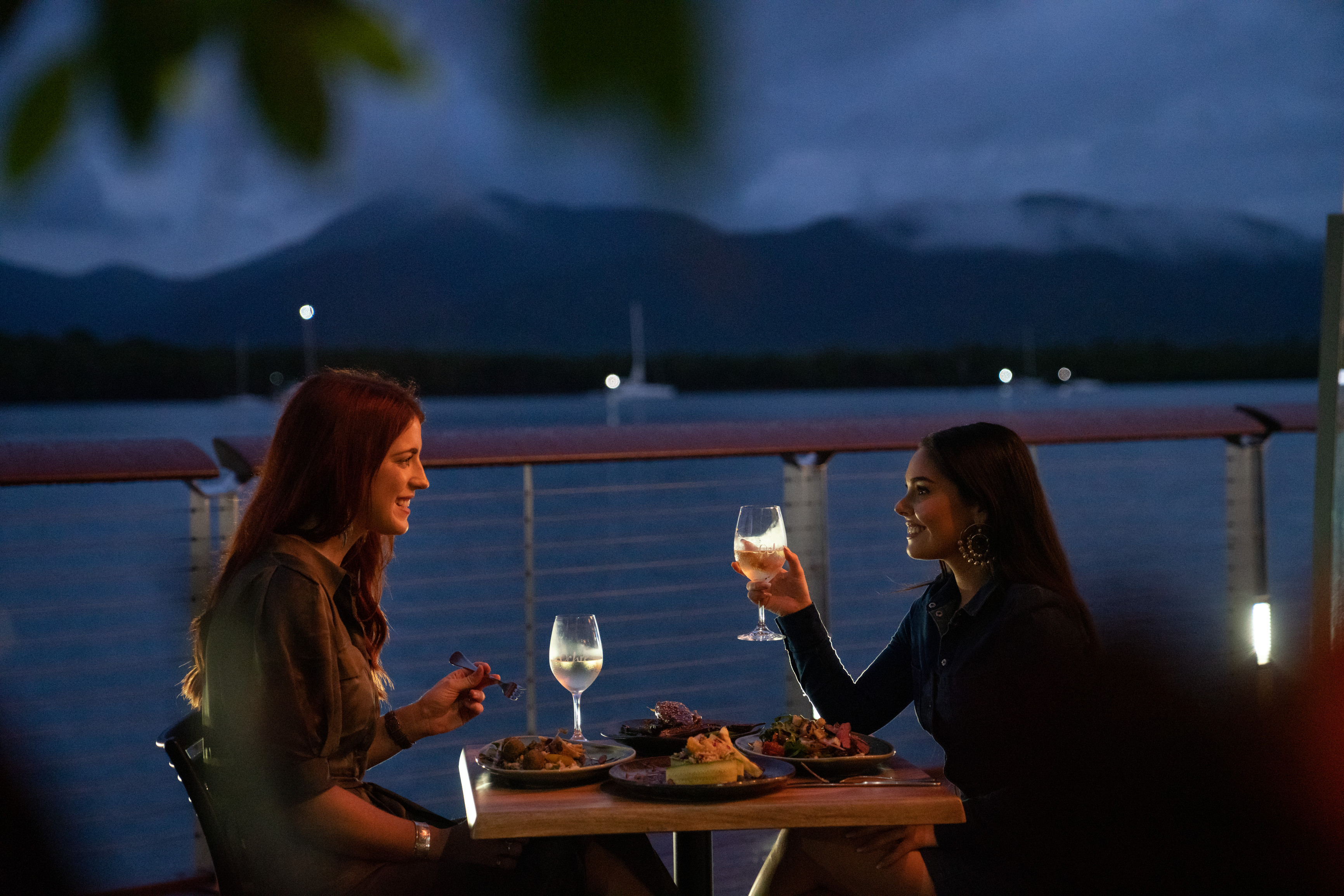 Friends eating dinner at Ochre Cairns | Cairns nightlife Friends eating dinner at Ochre Cairns | Cairns nightlife