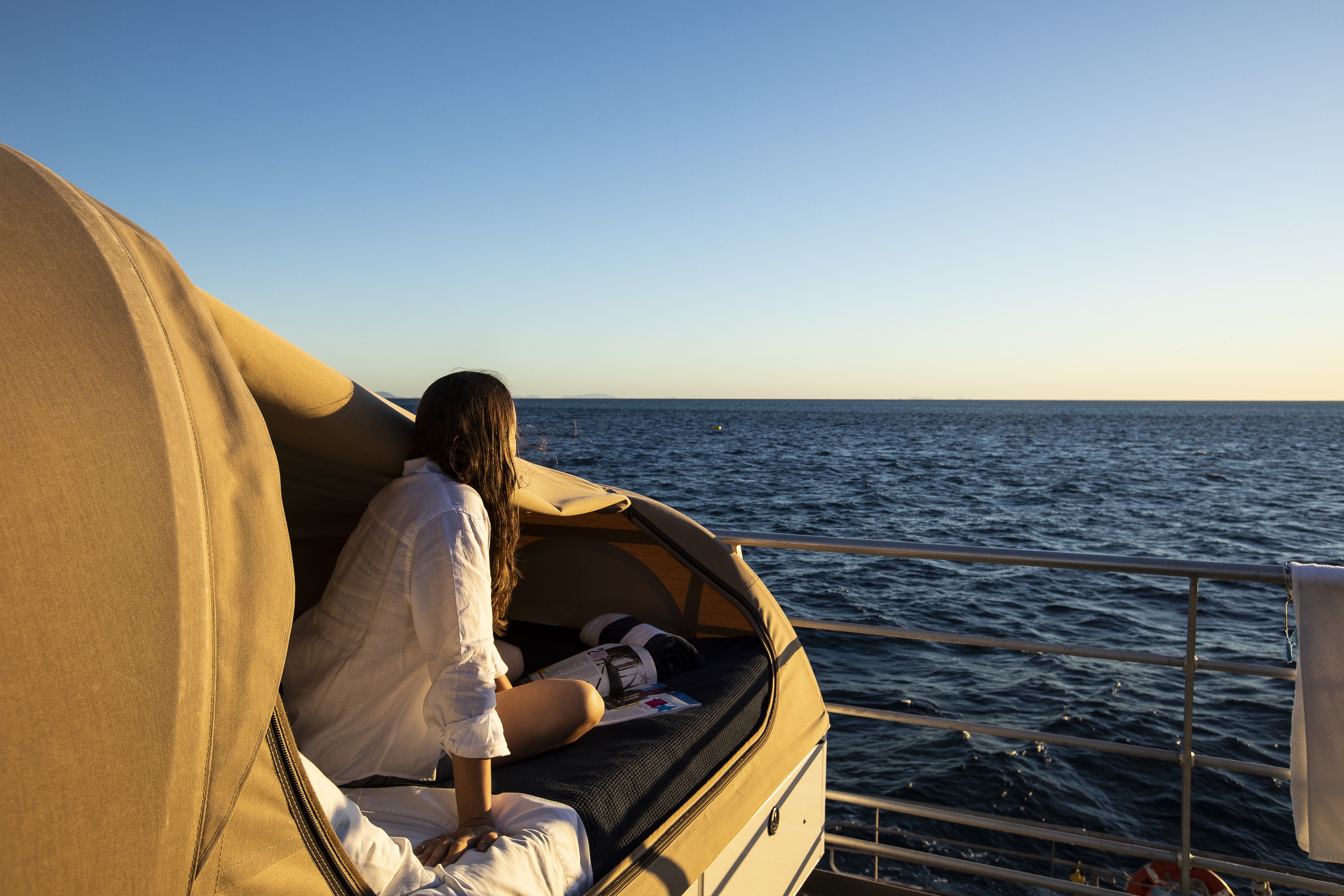 Watching the sunrise over the Great Barrier Reef from bed at ReefSleep | sleep on the Great Barrier Reef Watching the sunrise over the Great Barrier Reef from bed at ReefSleep | sleep on the Great Barrier Reef
