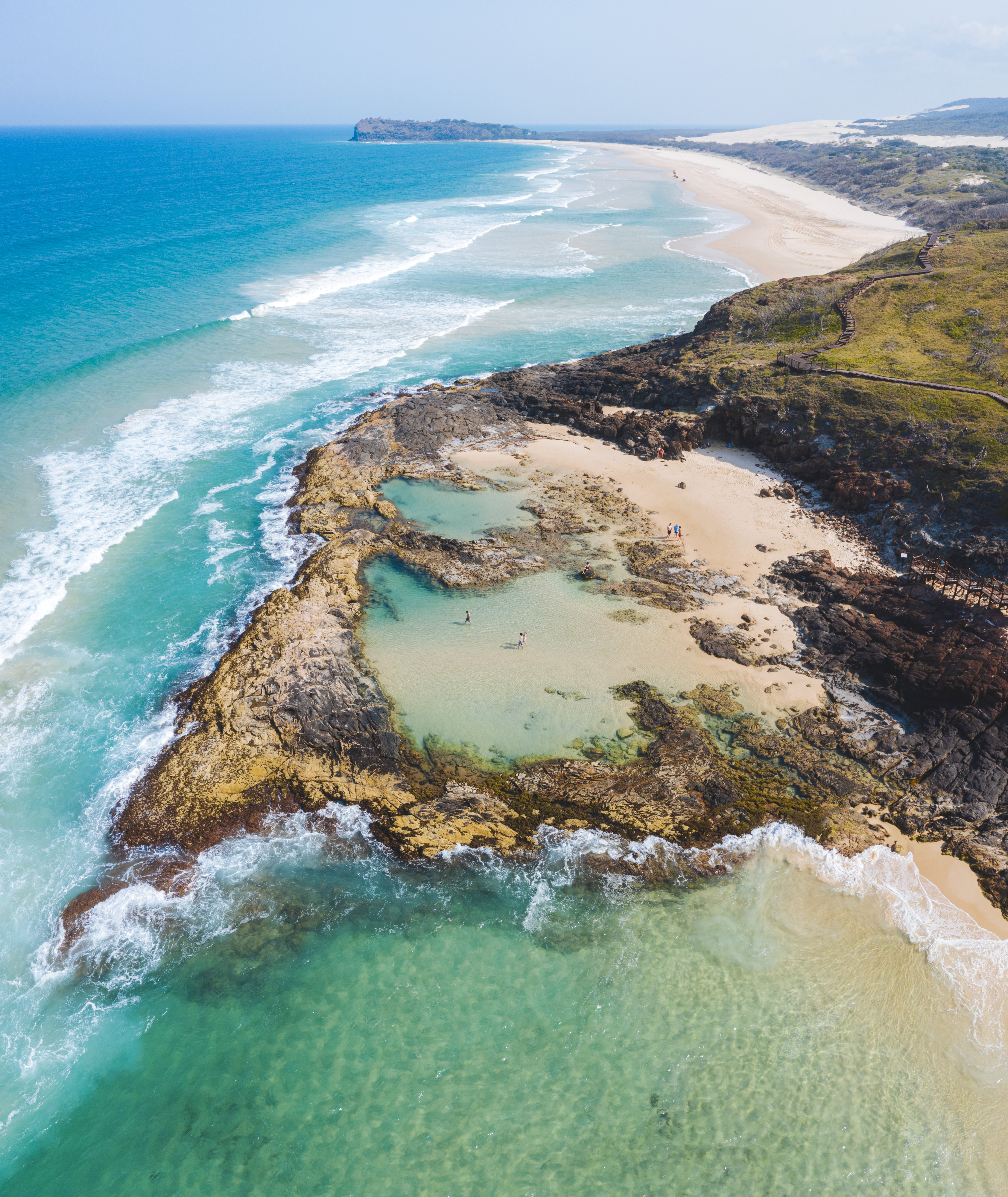 Aerial view of the Champagne Pools on K'gari, Great Sandy National Park Aerial view of the Champagne Pools on K'gari, Great Sandy National Park