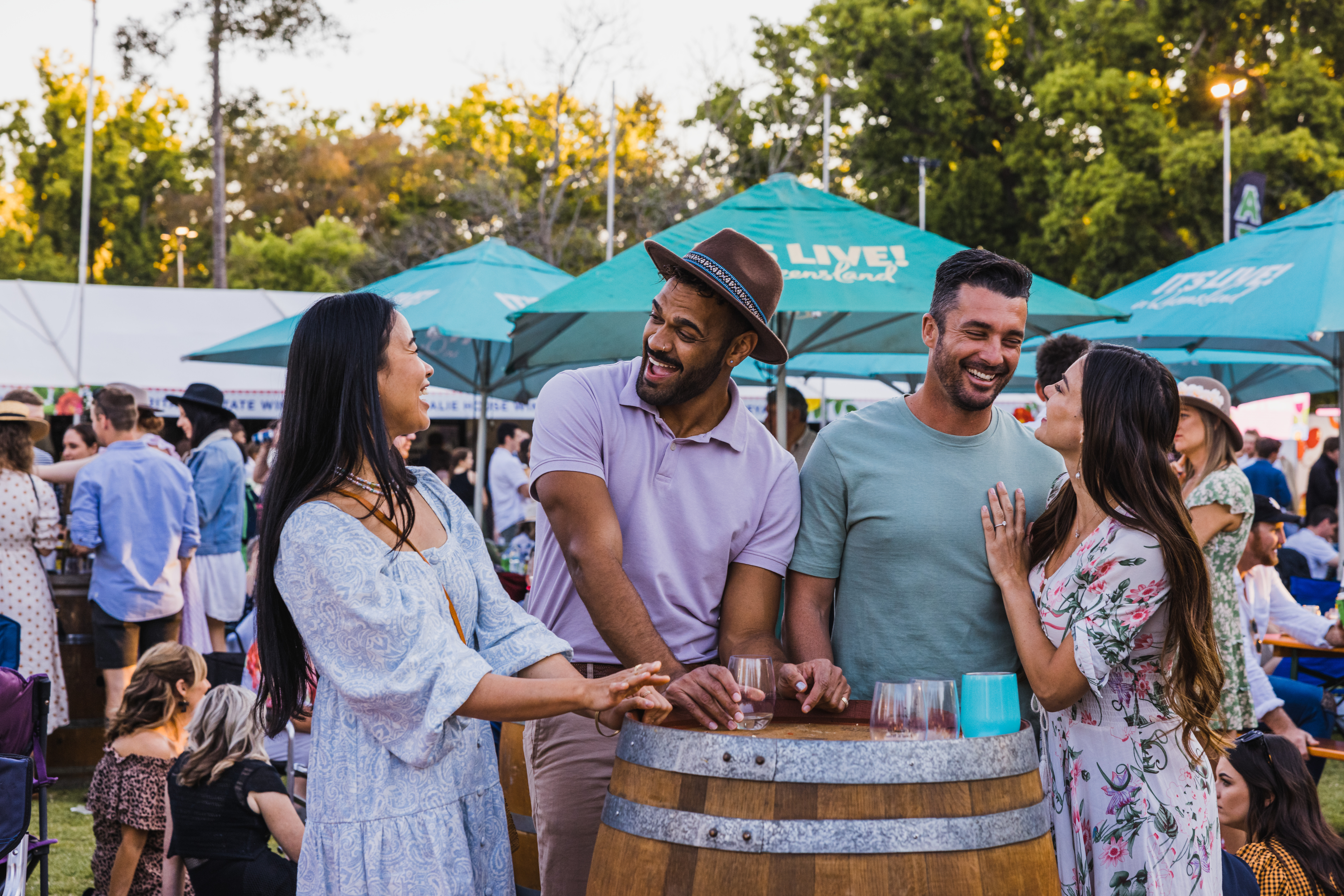 Four friends together at a food festival during Toowoomba Carnival of Flowers