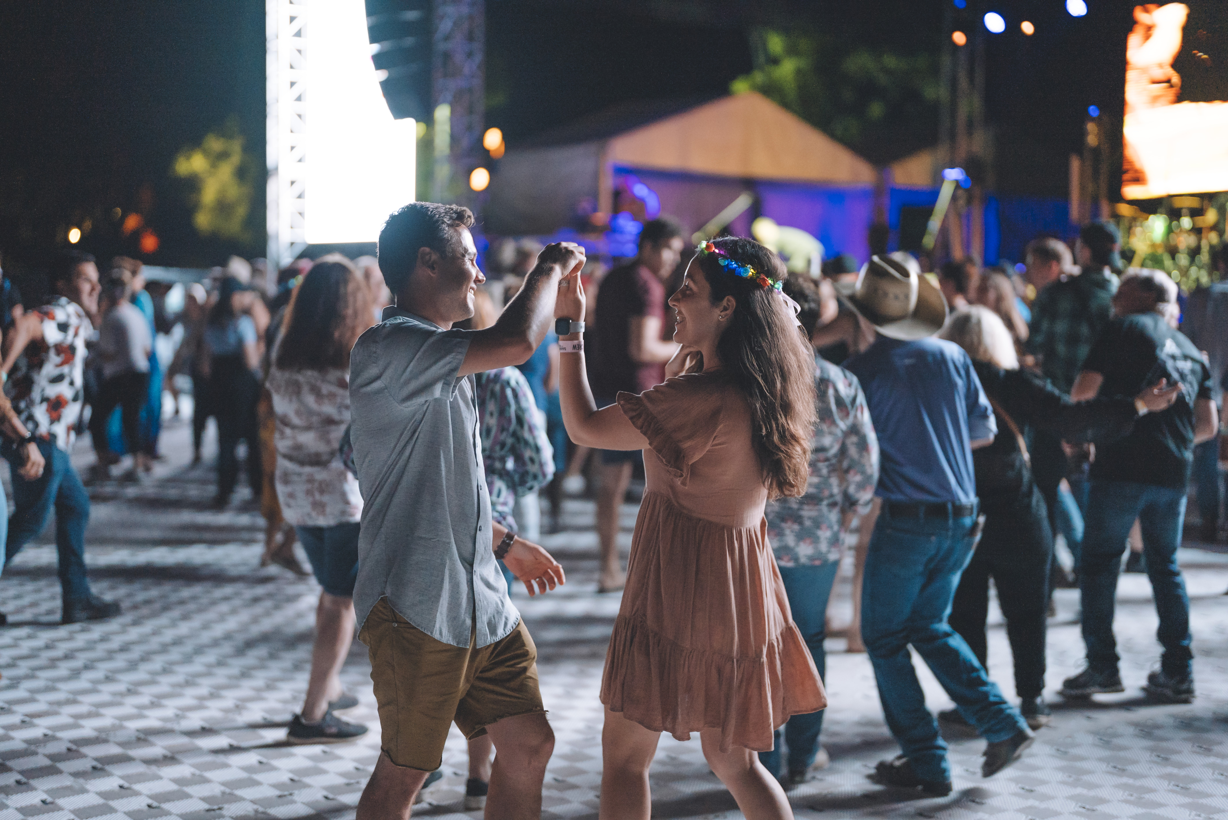 People dancing at Savannah in the Round, a music festival at Mareeba People dancing at Savannah in the Round, a music festival at Mareeba