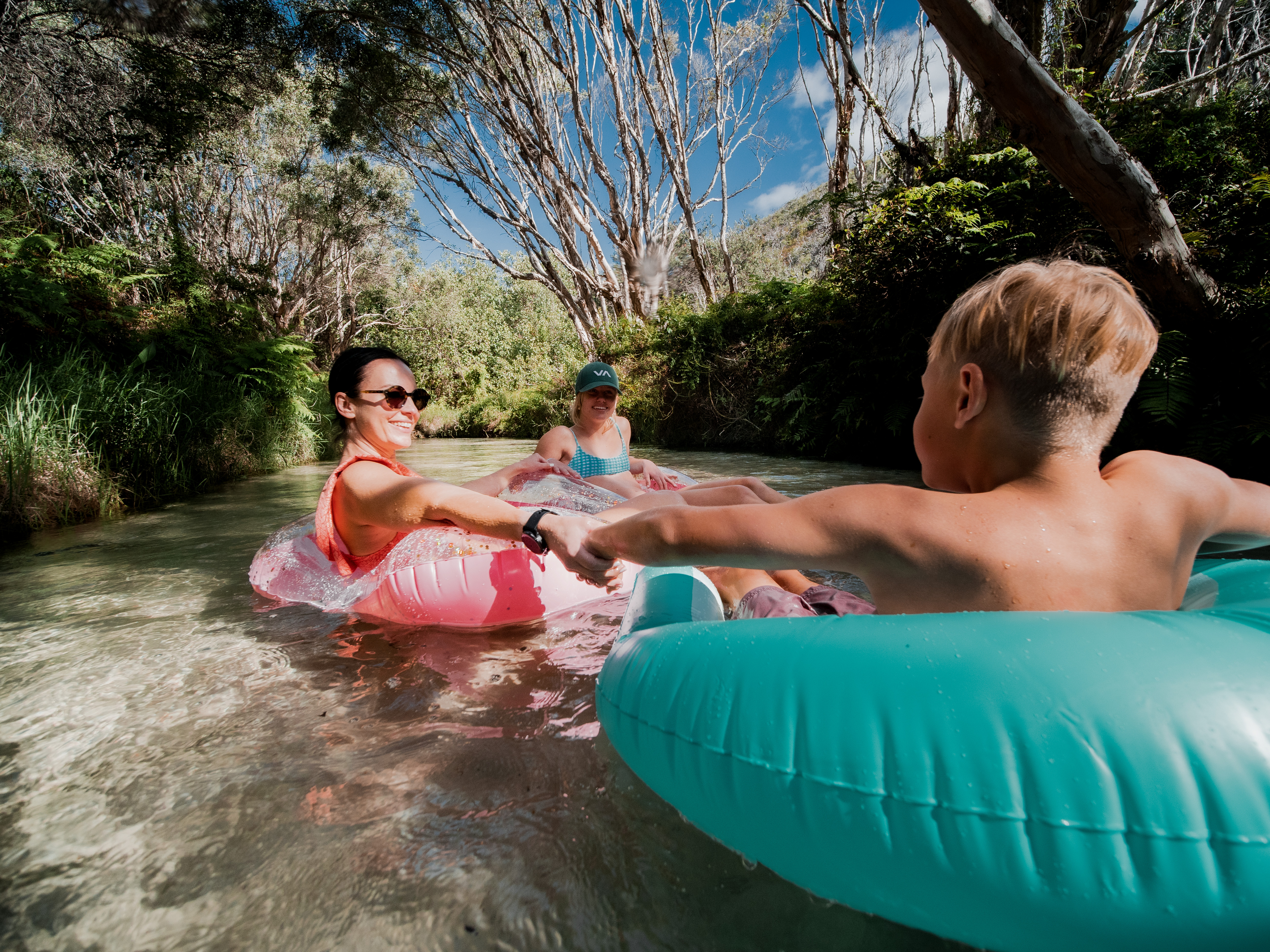 Family enjoying Eli Creek, as part of the Beauty Spots 4WD tour Family enjoying Eli Creek, as part of the Beauty Spots 4WD tour